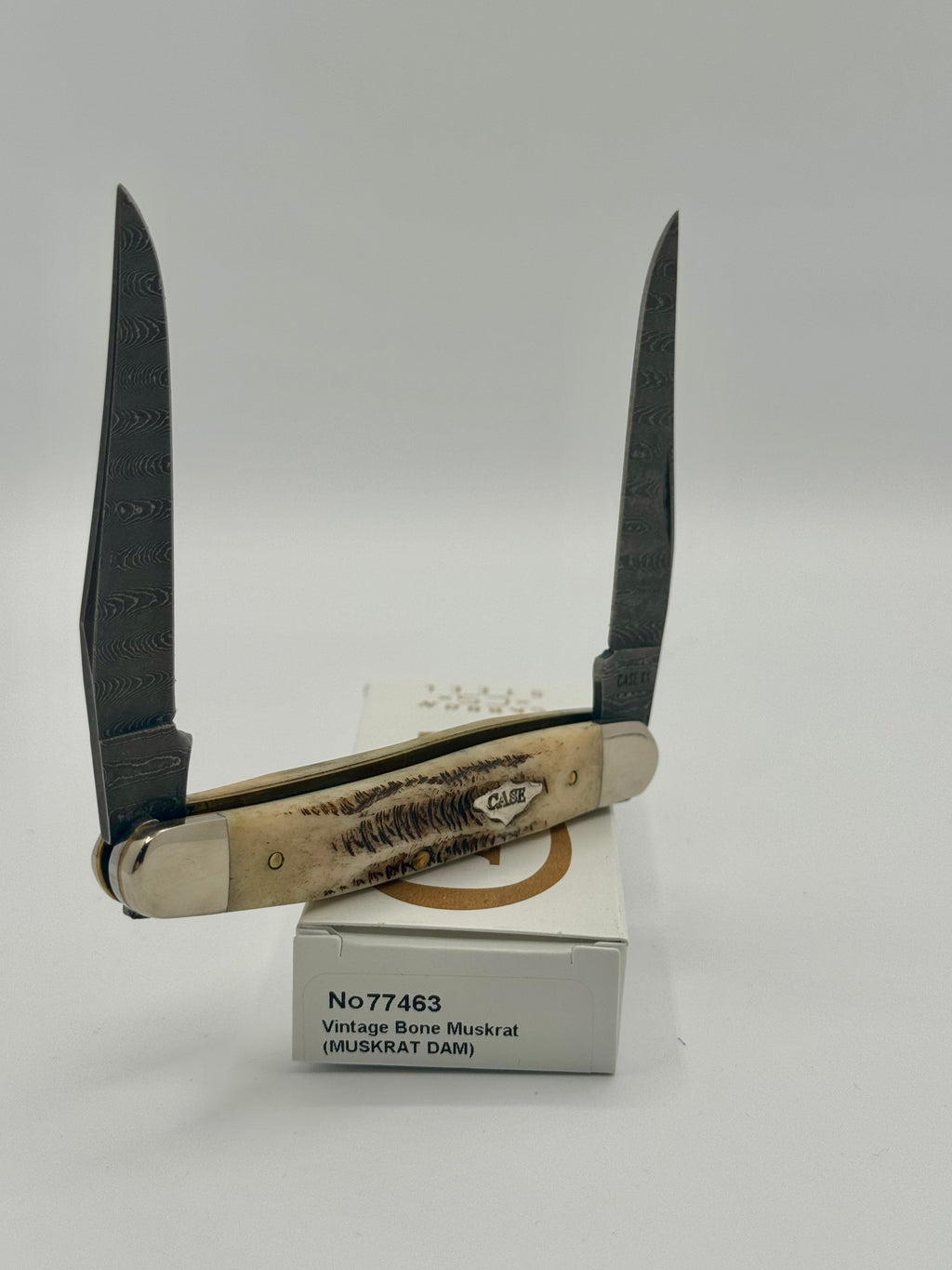 Case XX 77460 Vintage Bone Trapper Damascus — open on Case retail box