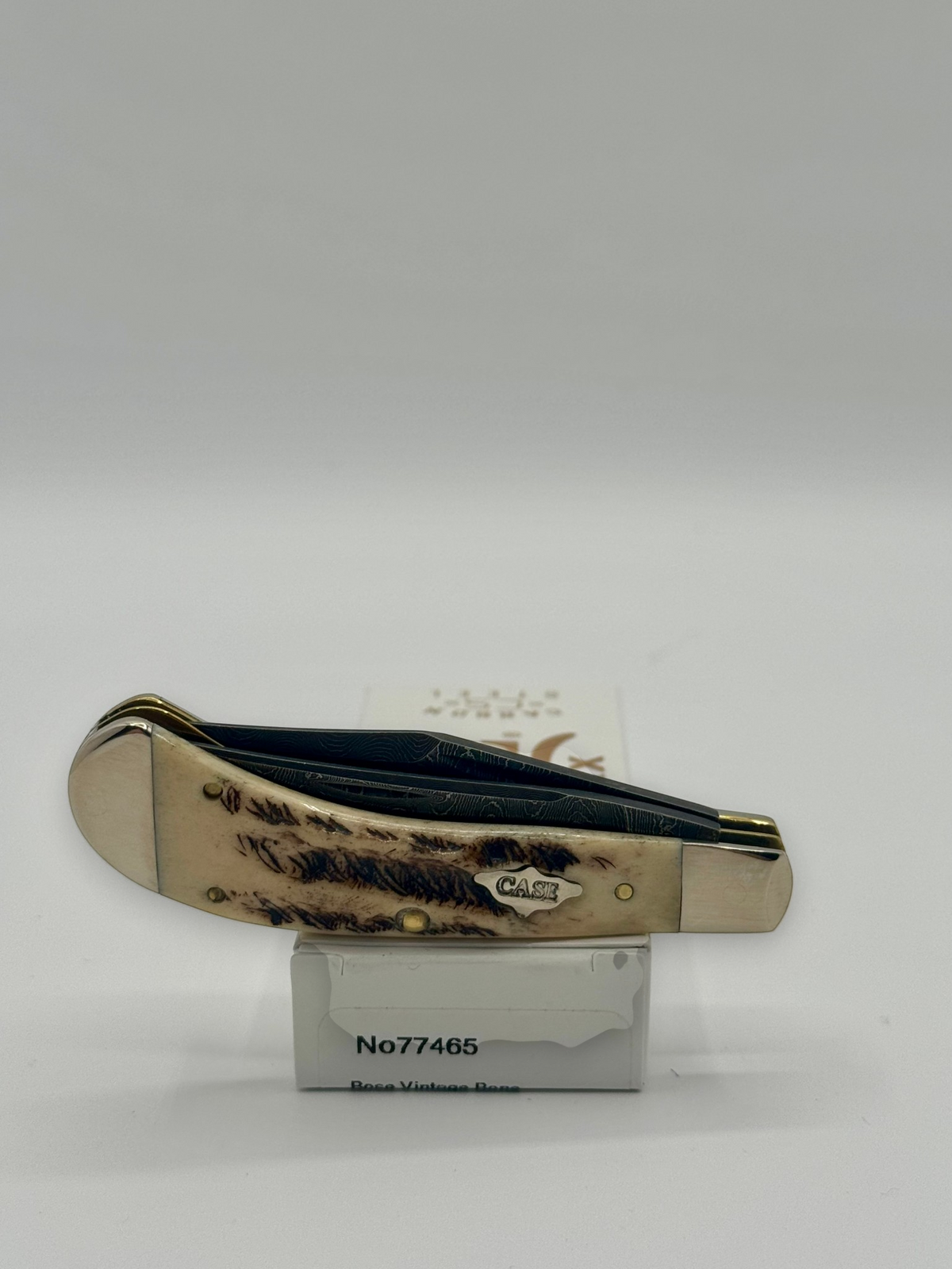 Case XX 77465 Vintage Bone Small Saddlehorn — lifestyle angle on Case box