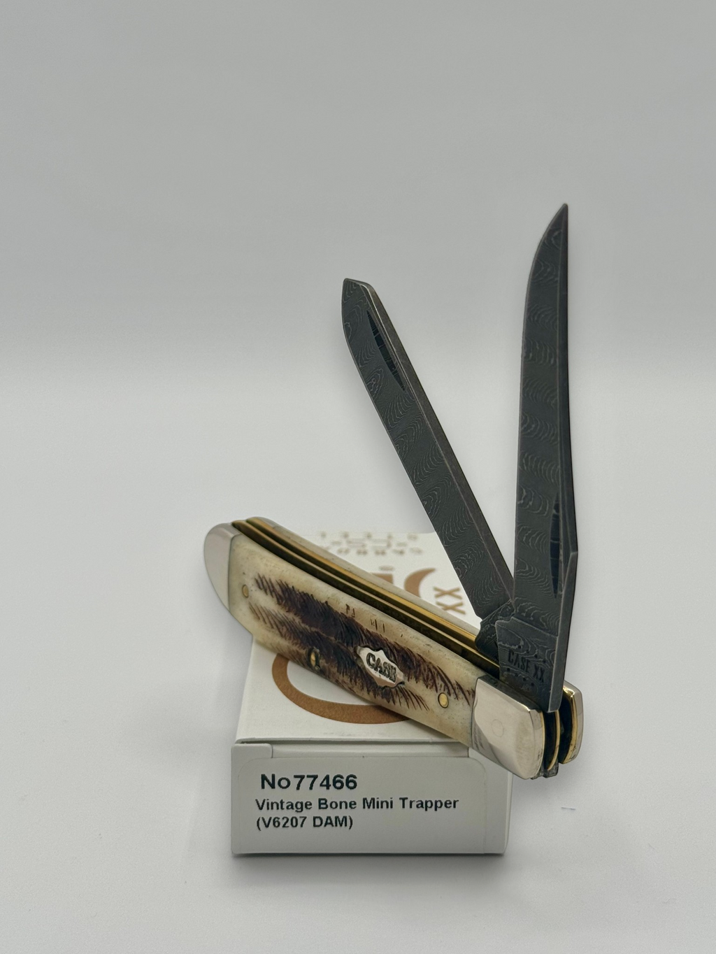 Case XX 77466 Vintage Bone Mini Trapper — closed on Case box