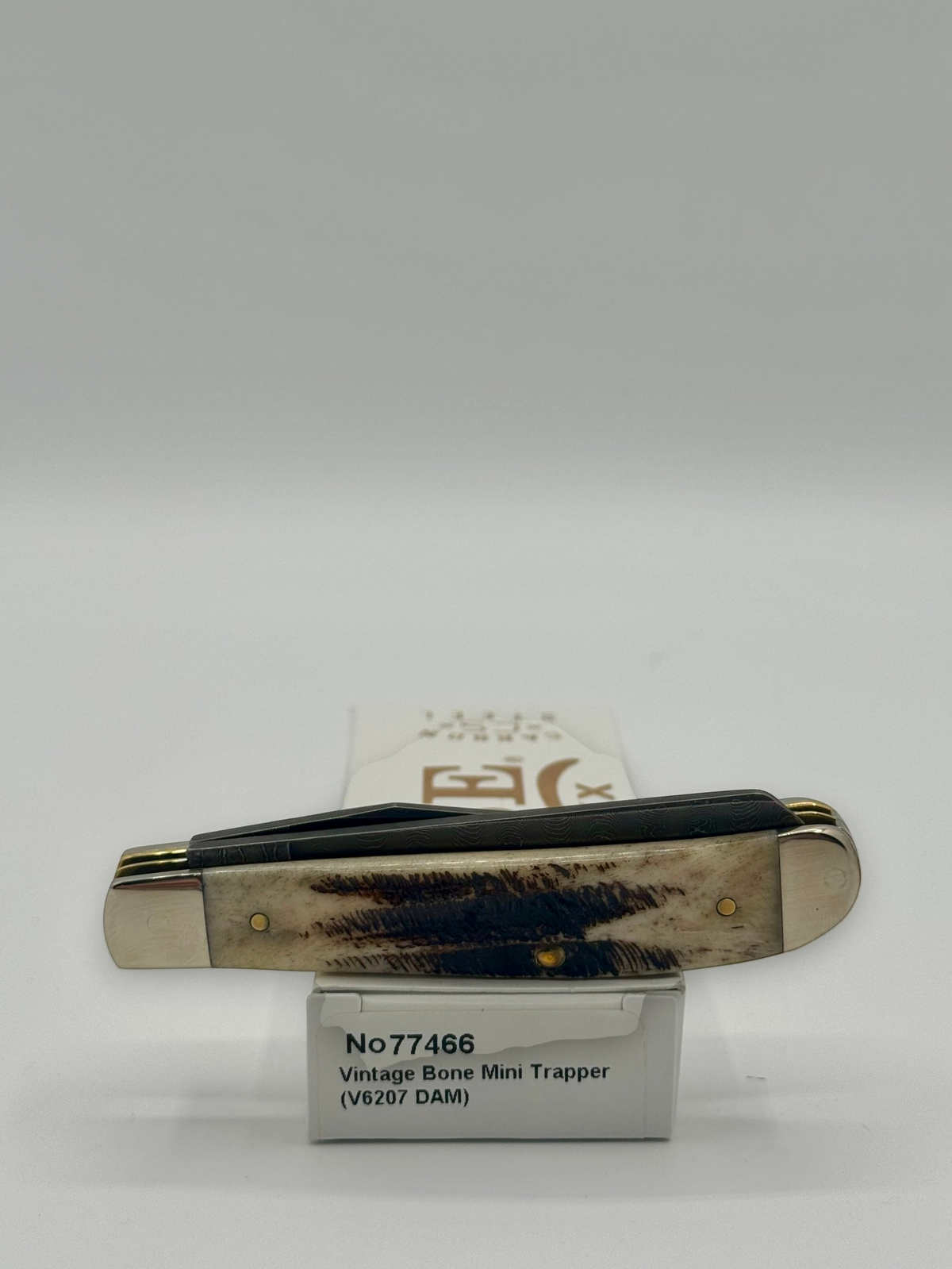 Case XX 77466 Vintage Bone Mini Trapper — packaging and knife together