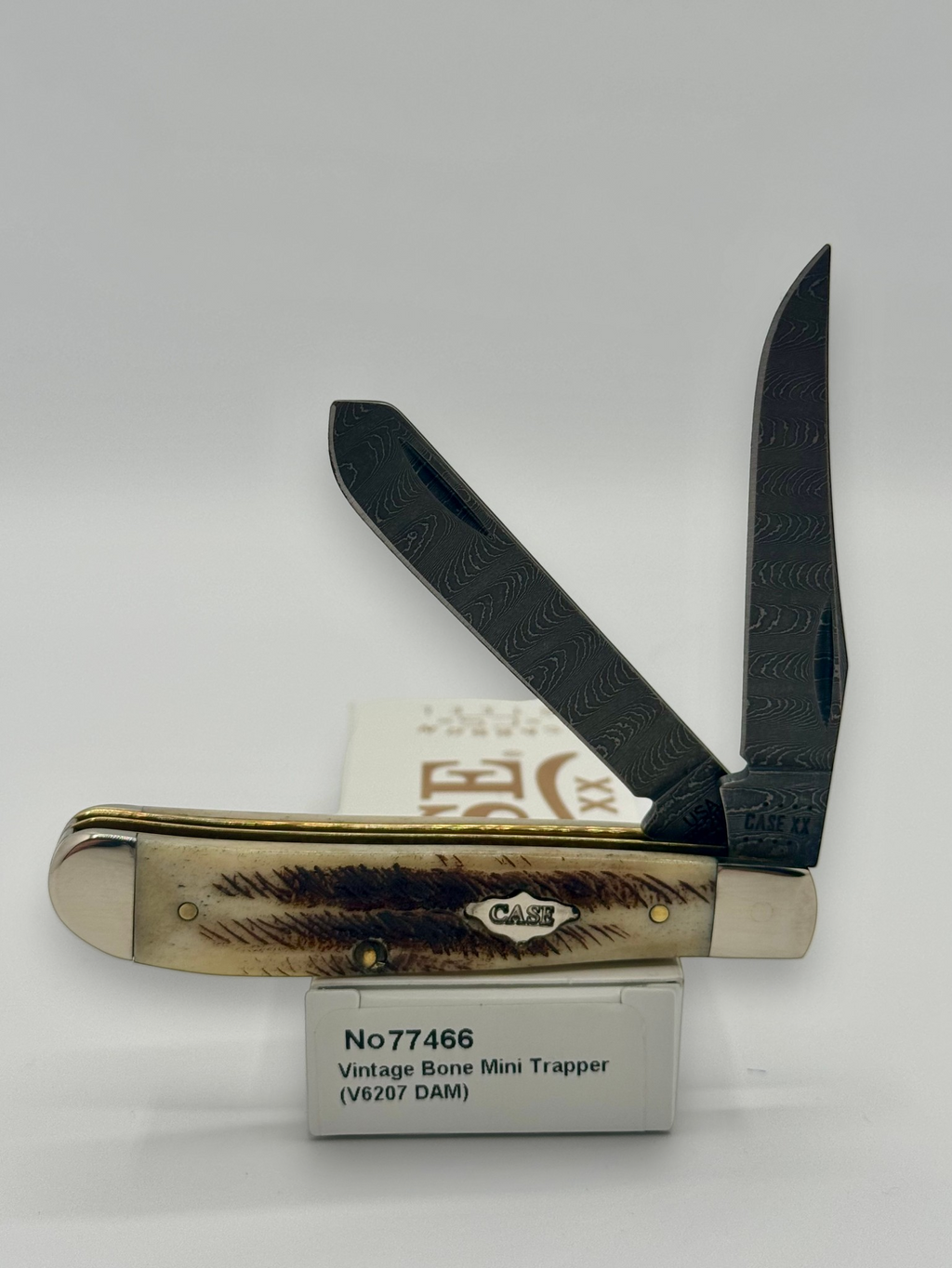 Case XX 77466 Vintage Bone Mini Trapper — open on Case retail box