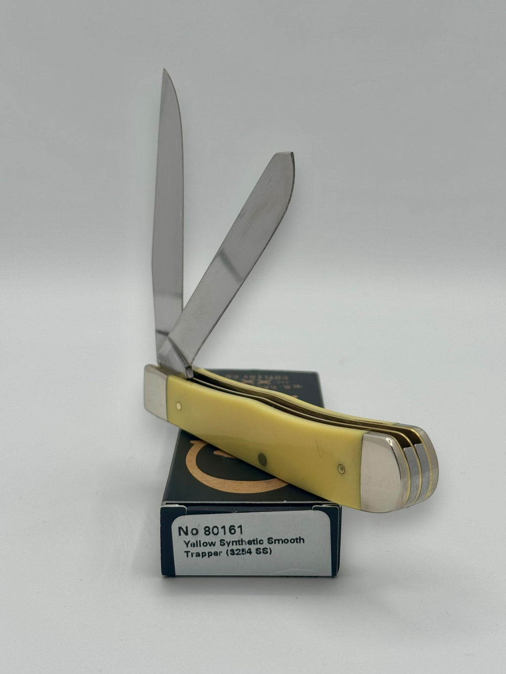 Case XX 80161BF Bass Fever Yellow Syn Trapper — handle and shield detail
