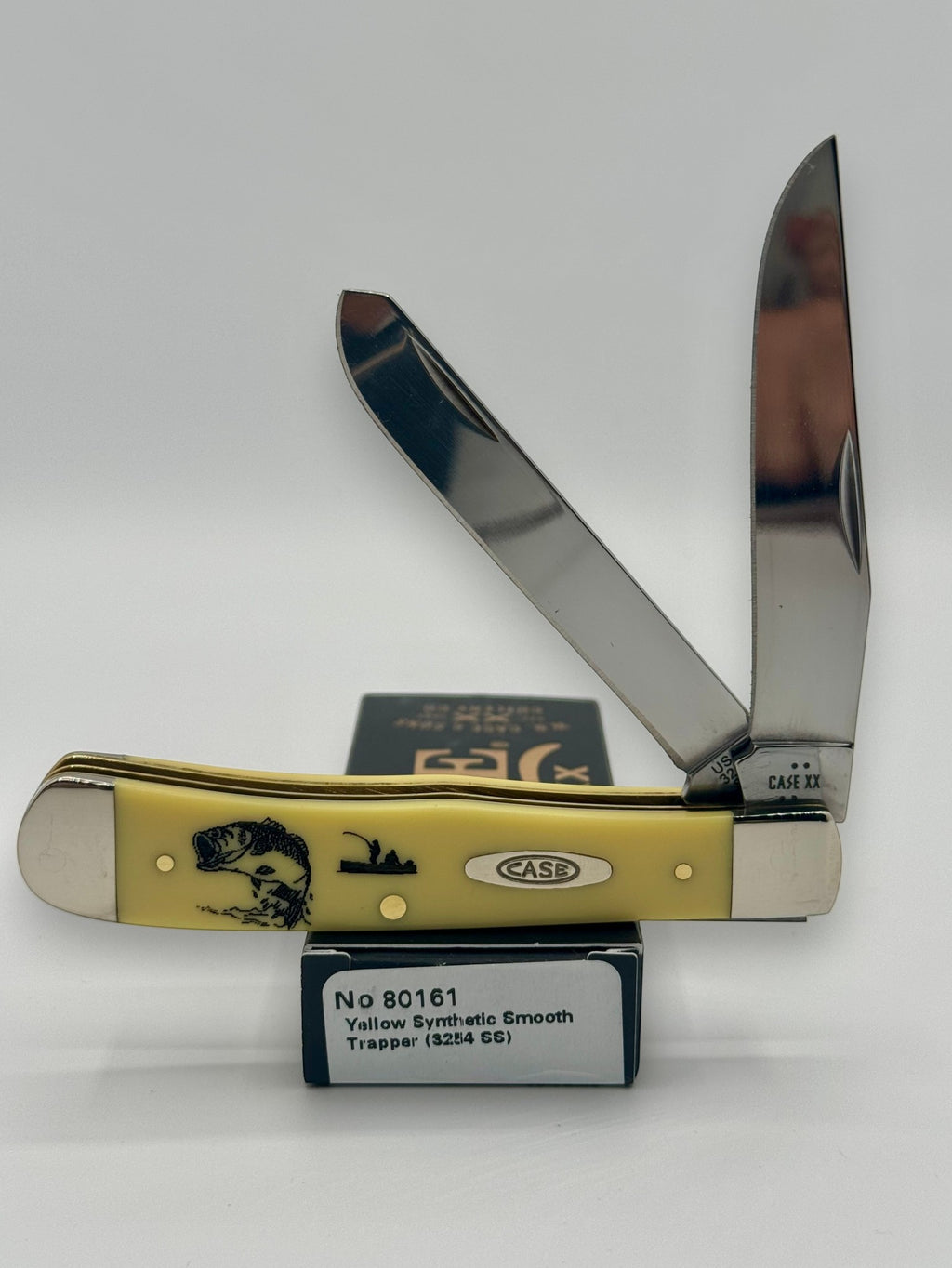 Case XX 80161BF Bass Fever Yellow Syn Trapper — open on Case retail box