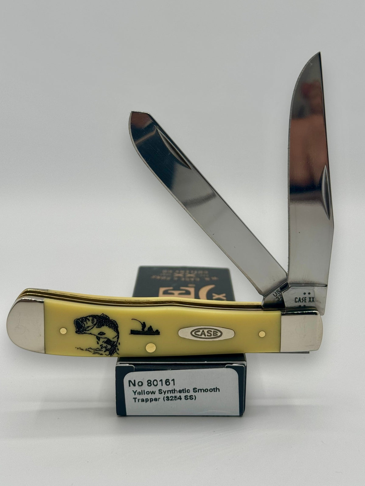 Case XX 80161BF Bass Fever Yellow Syn Trapper — open on Case retail box
