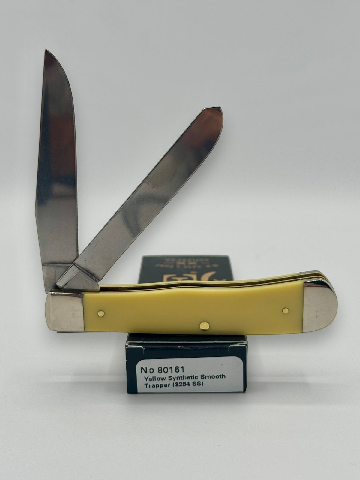 Case XX 80161C Case Logo Yellow Syn Trapper — angled open view