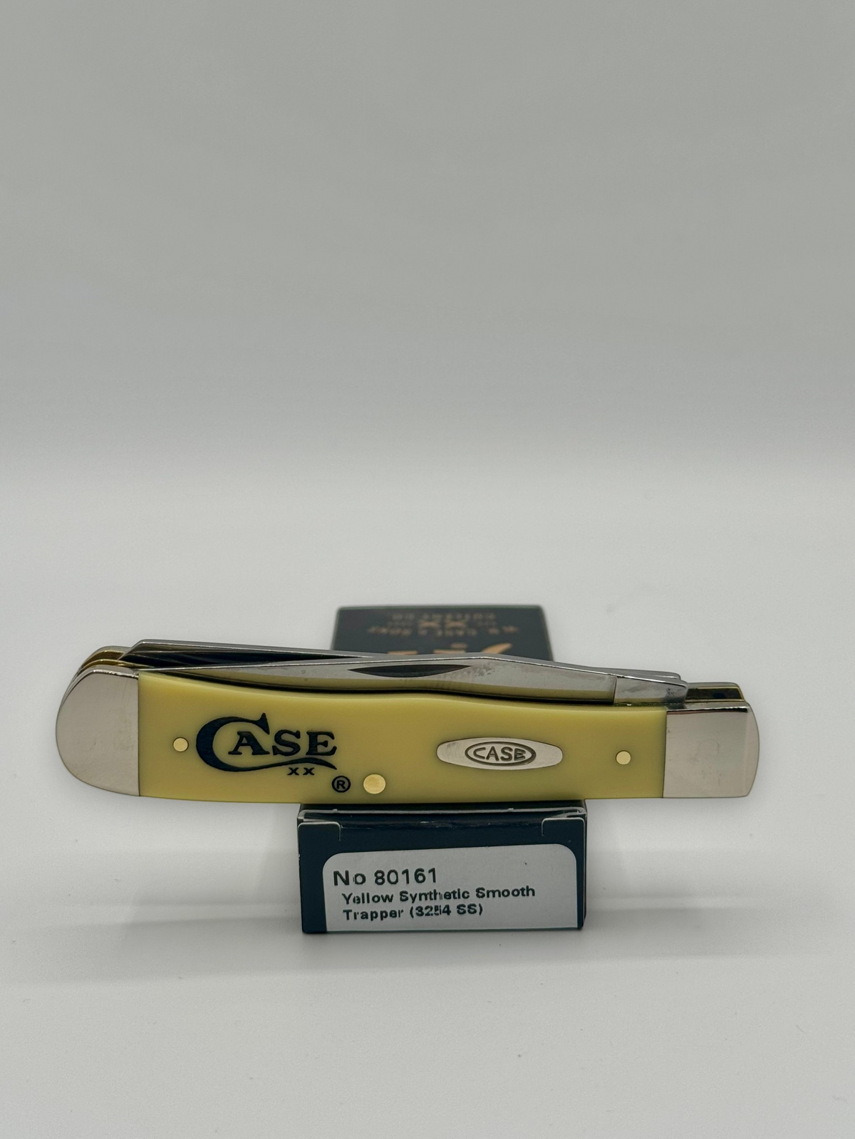Case XX 80161C Case Logo Yellow Syn Trapper — lifestyle angle on Case box