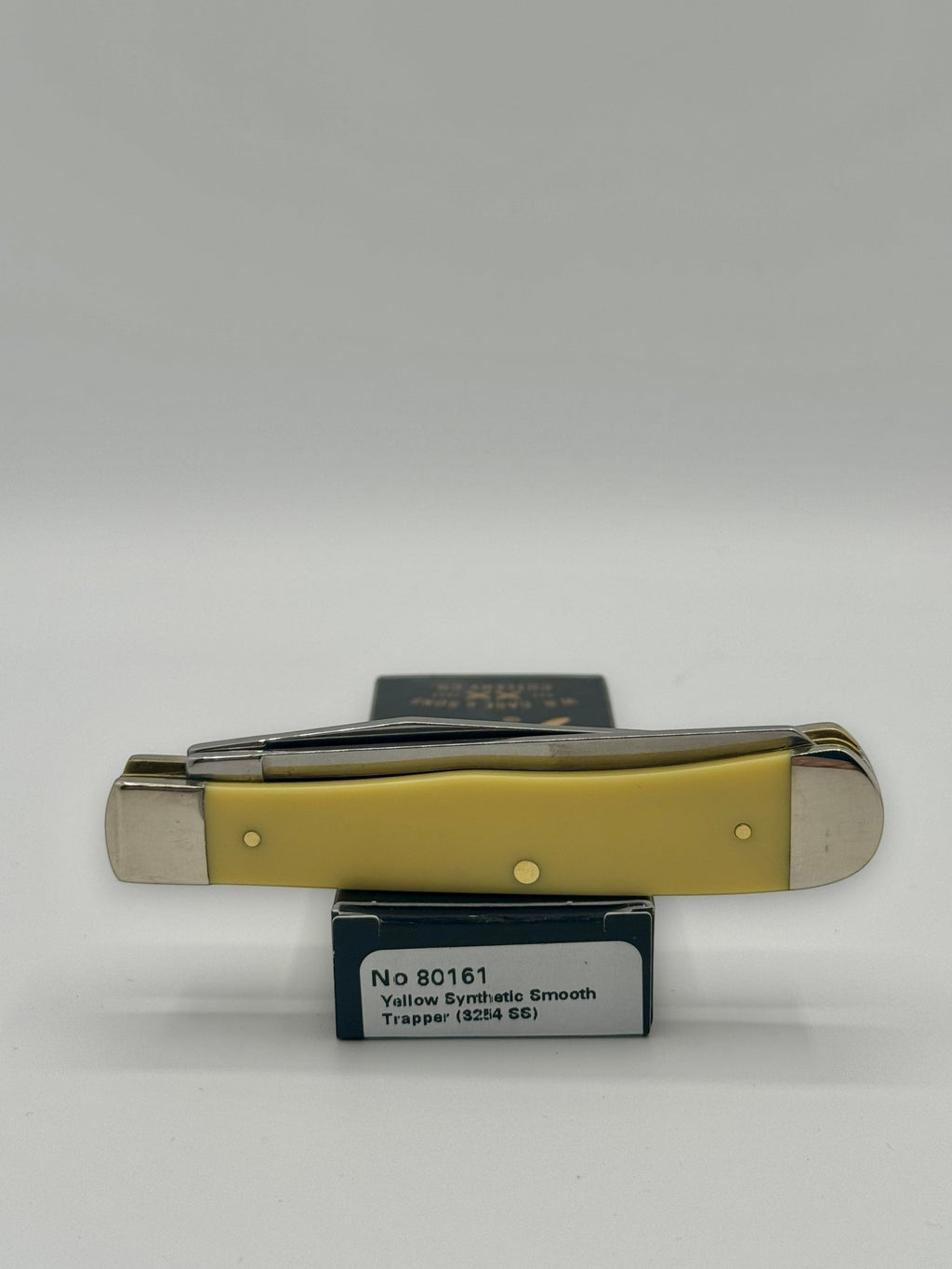 Case XX 80161C Case Logo Yellow Syn Trapper — packaging and knife together