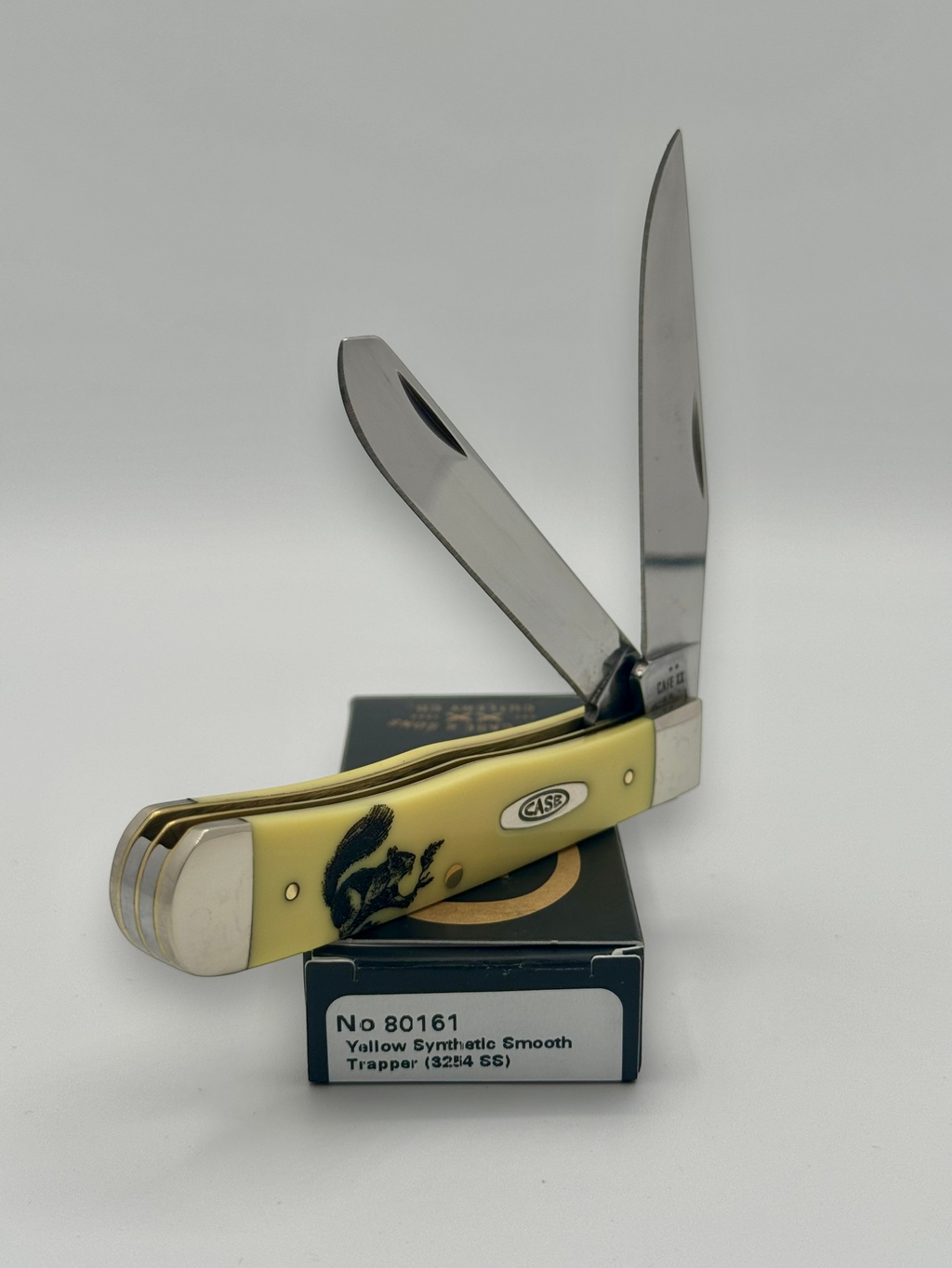 Case XX 80161SQ Squirrel Yellow Syn Trapper — blade detail on Case box