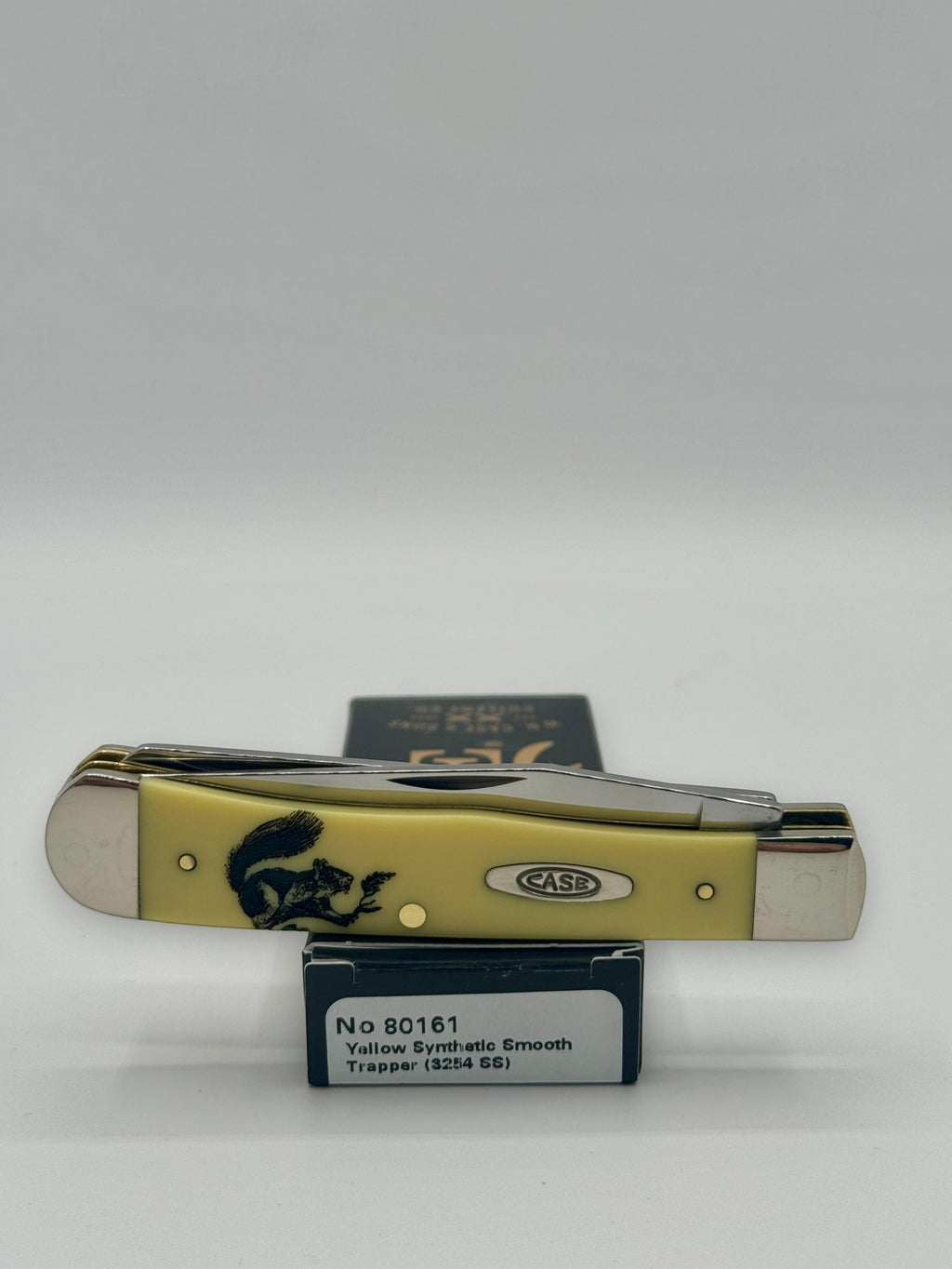 Case XX 80161SQ Squirrel Yellow Syn Trapper — lifestyle angle on Case box