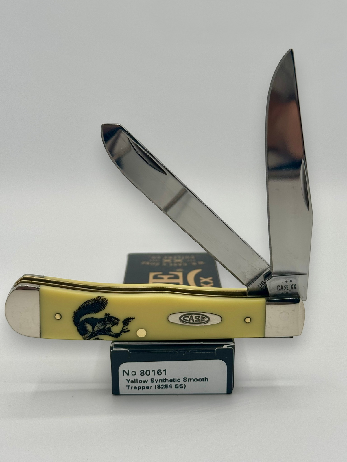 Case XX 80161SQ Squirrel Yellow Syn Trapper — open on Case retail box