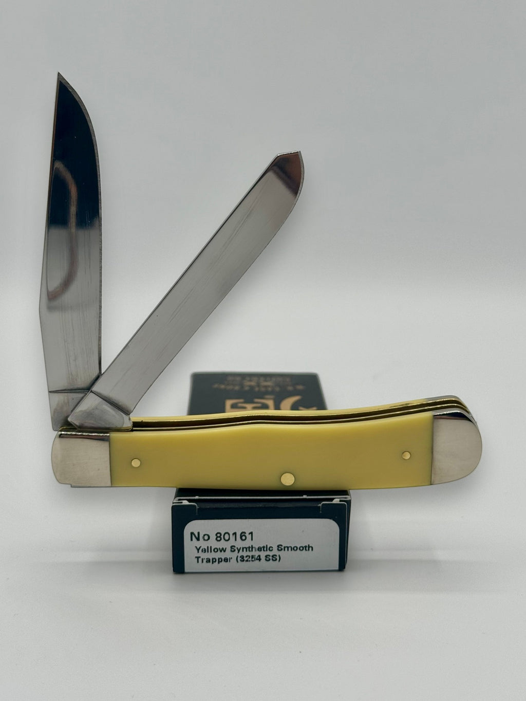 Case XX 80161T Turkey Yellow Syn Trapper — angled open view