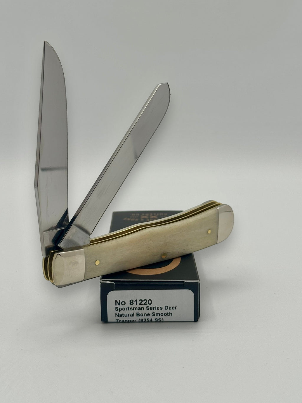 Case XX 81220 Sportsman Deer Bone Trapper — back side on Case box