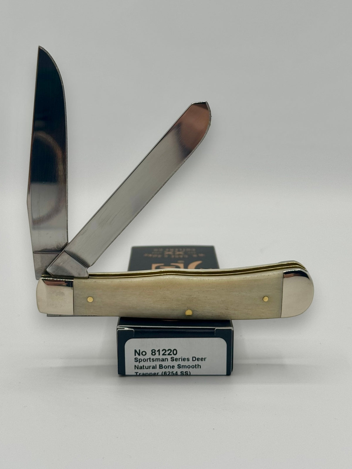 Case XX 81220 Sportsman Deer Bone Trapper — angled open view