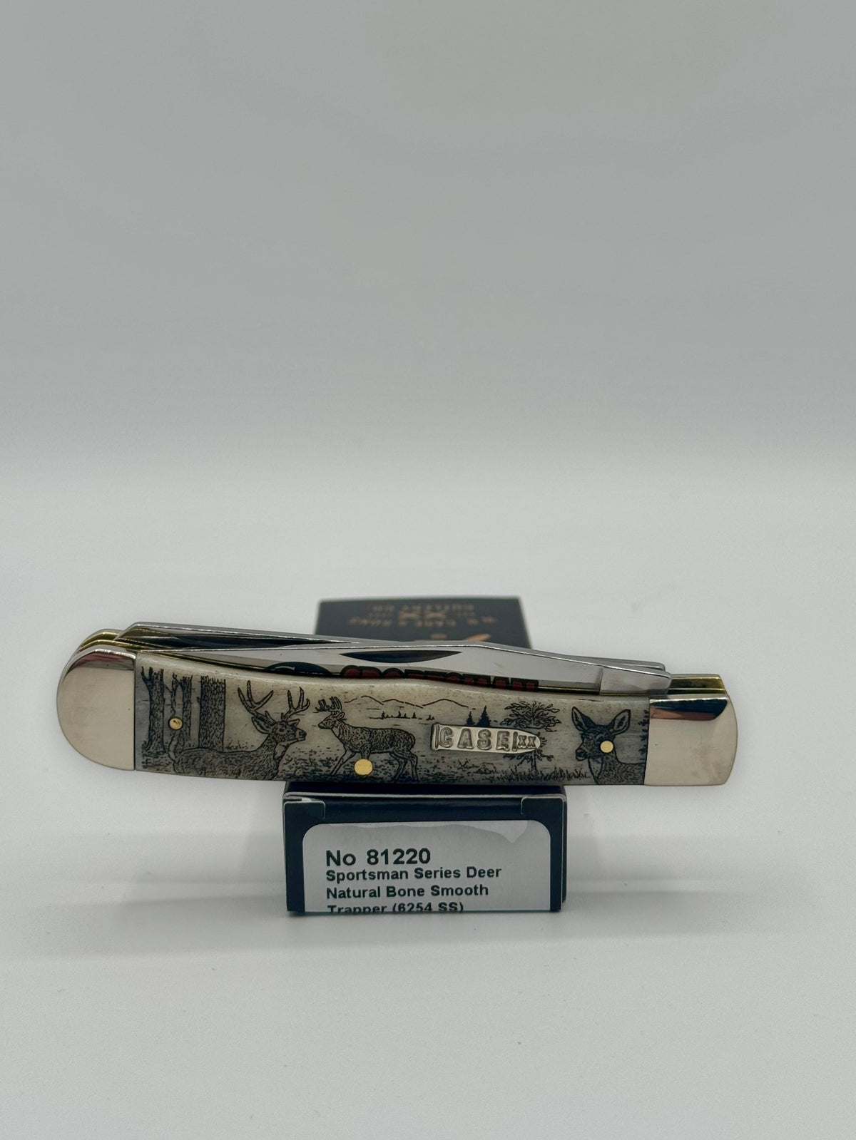 Case XX 81220 Sportsman Deer Bone Trapper — lifestyle angle on Case box