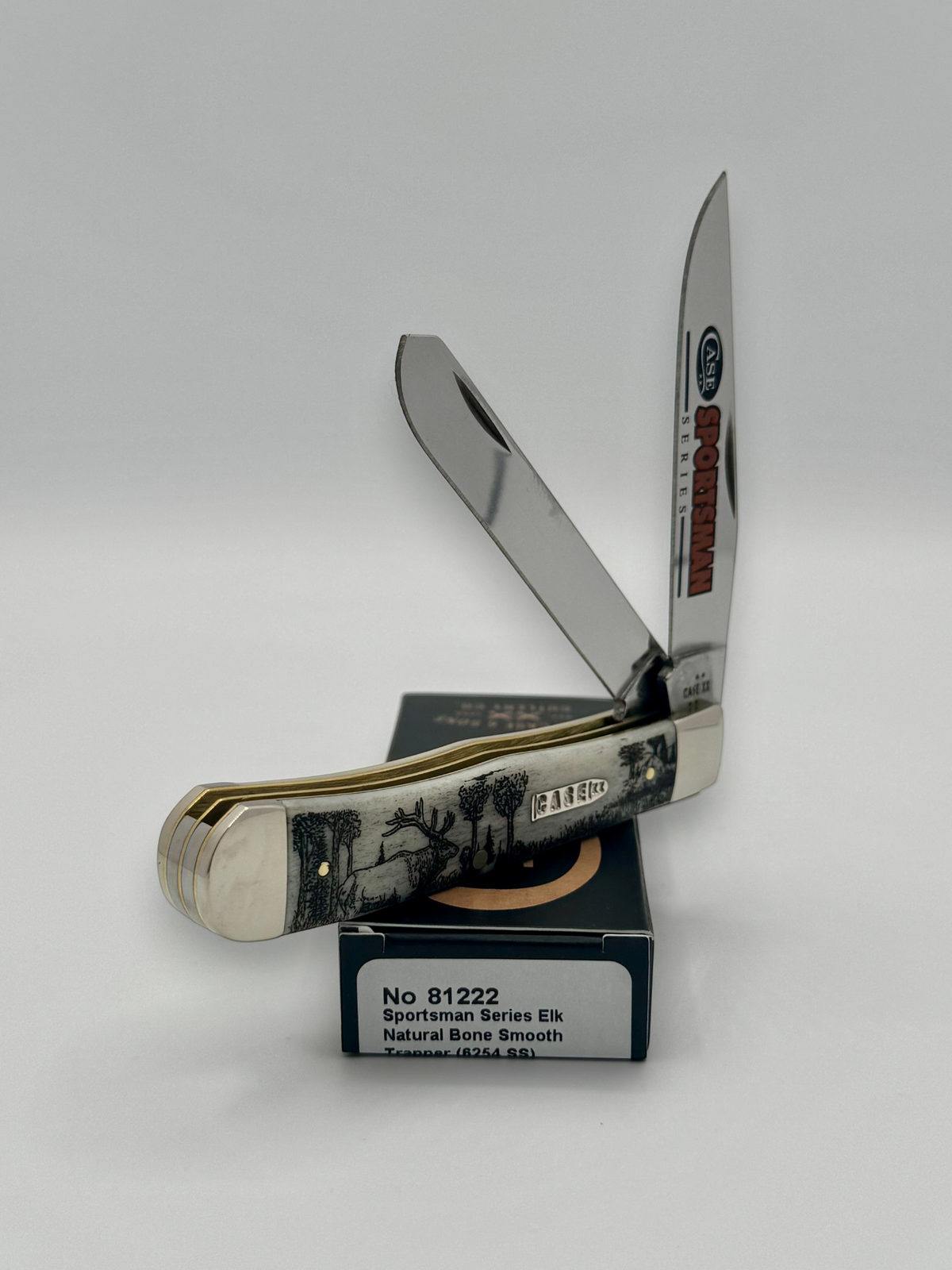 Case XX 81222 Sportsman Elk Bone Trapper — blade detail on Case box