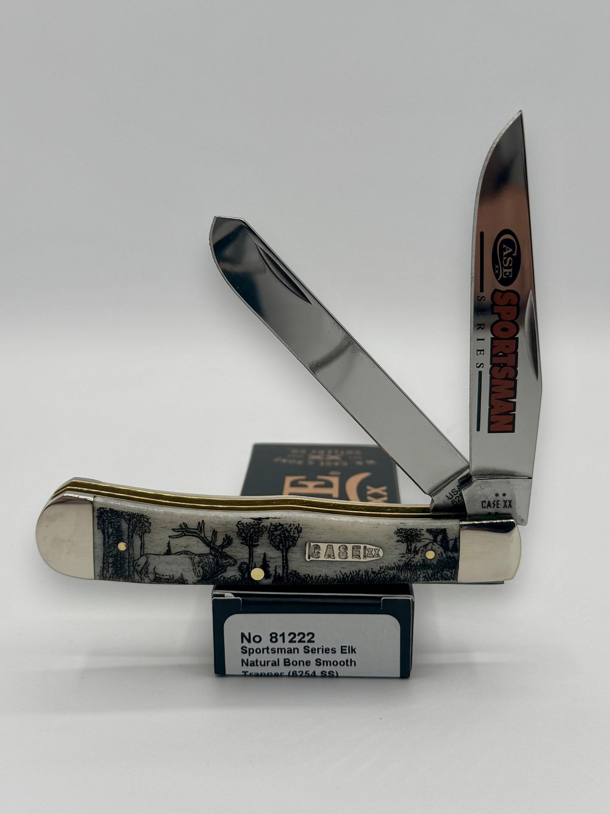 Case XX 81222 Sportsman Elk Bone Trapper — open on Case retail box