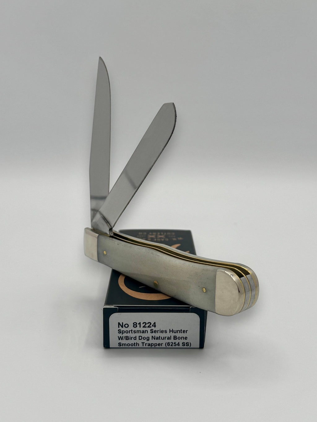 Case XX 81224 Bird Dog Bone Trapper — handle and shield detail