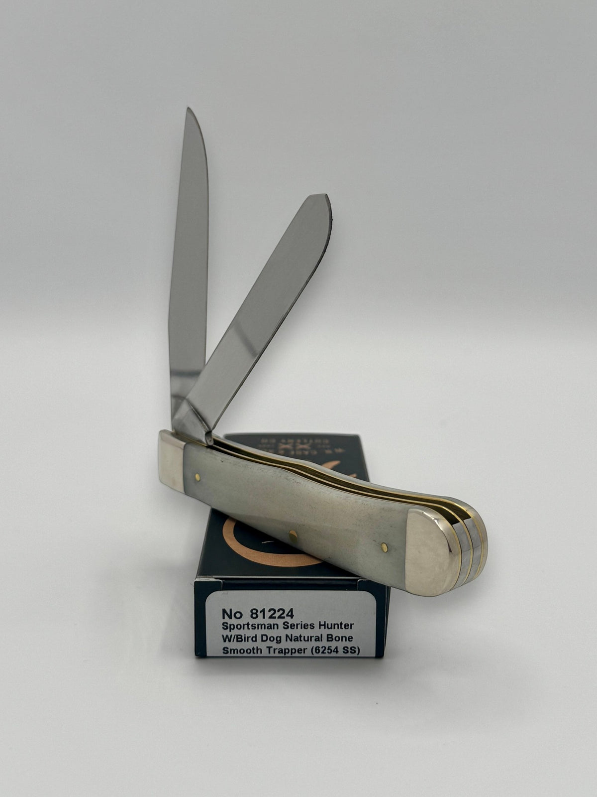 Case XX 81224 Bird Dog Bone Trapper — handle and shield detail