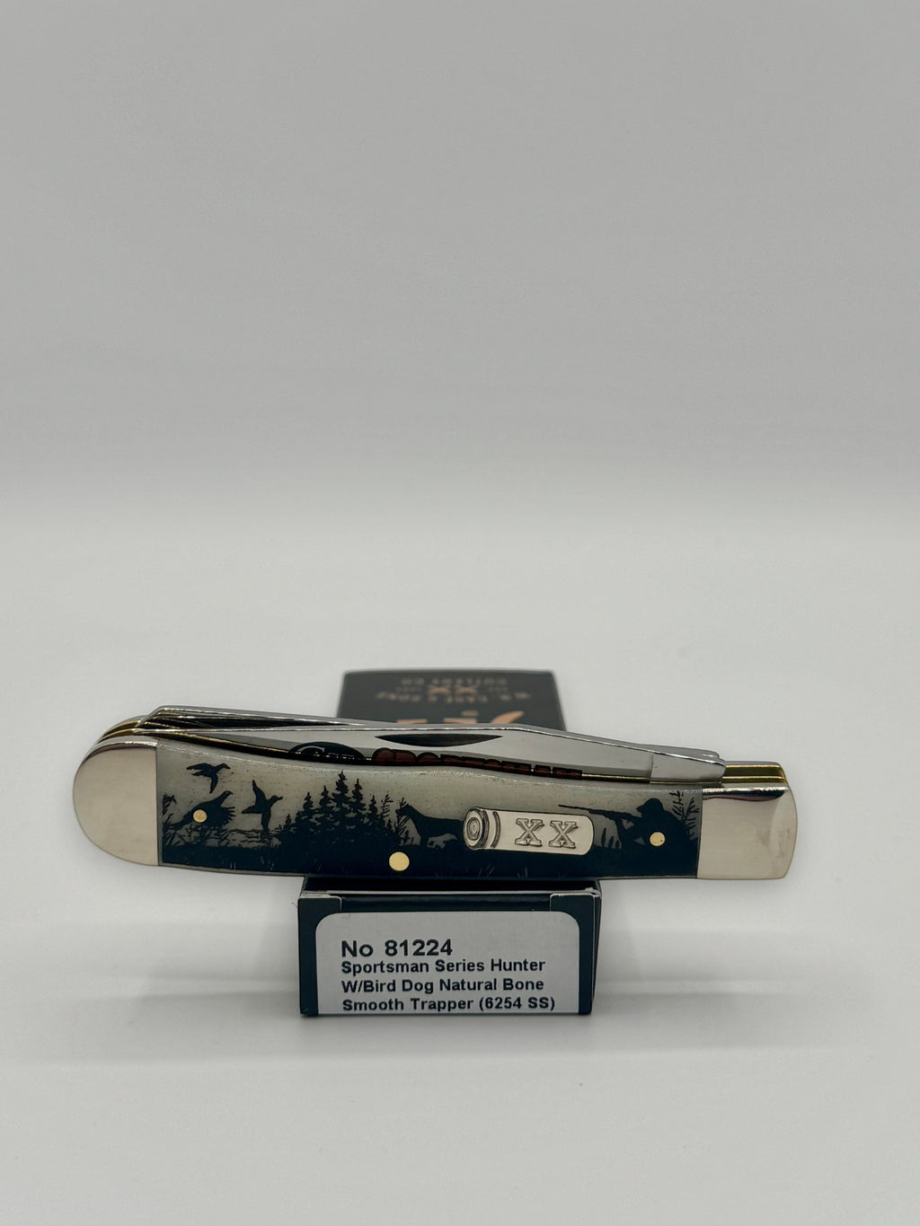 Case XX 81224 Bird Dog Bone Trapper — lifestyle angle on Case box