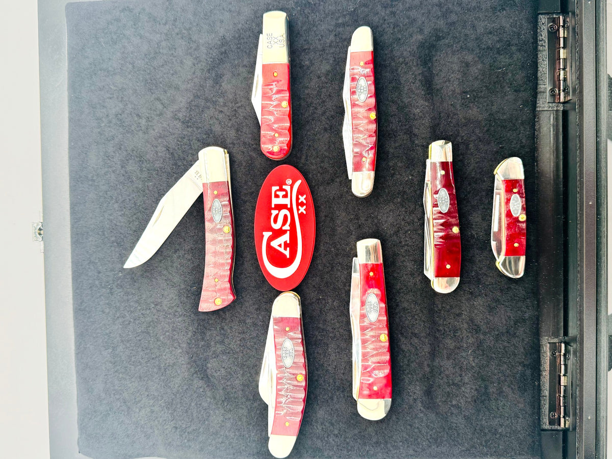 Case XX RGJSET 7-Piece Red Gator Jig Set — knives arranged in velvet display