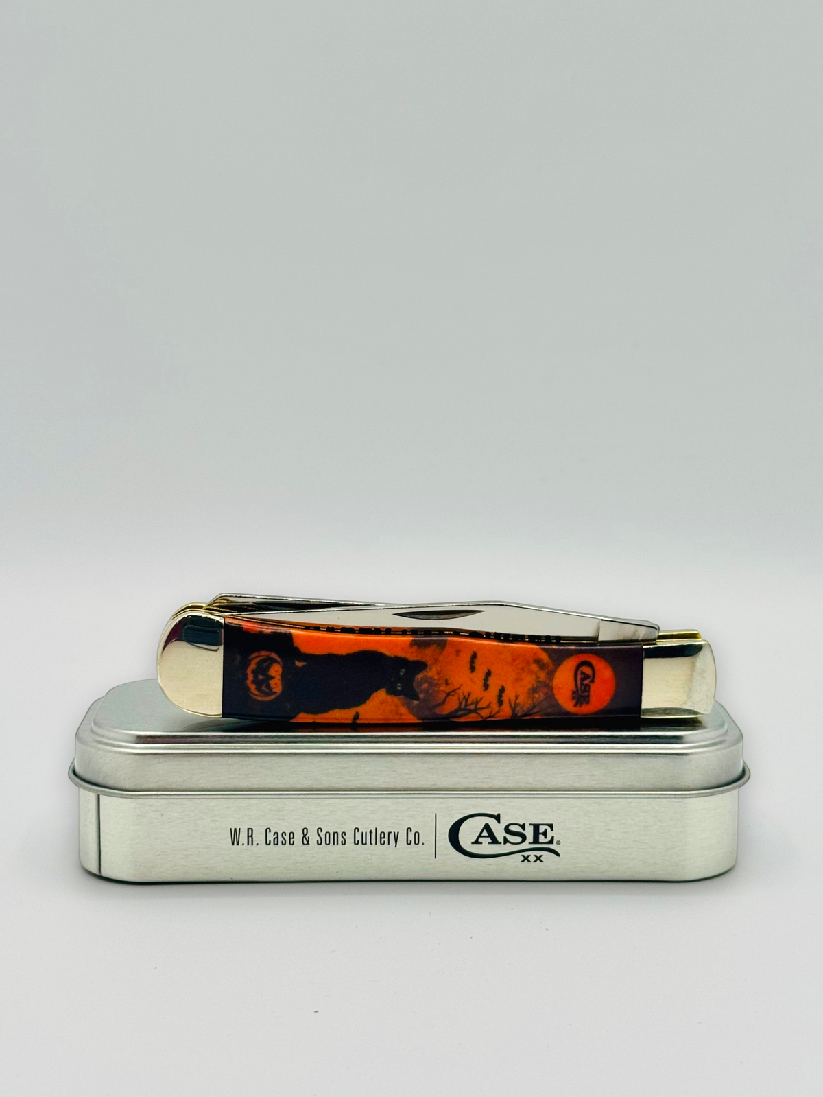 Case XX 13365 Halloween CCI White Synthetic Trapper — profile with Halloween tin