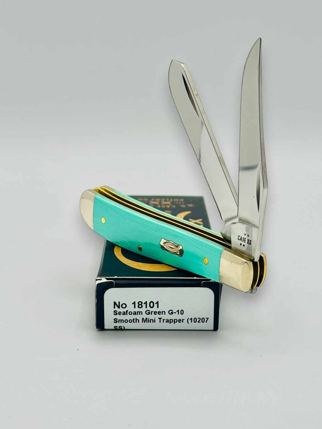 Case XX 18101 Seafoam Green G-10 Mini Trapper — closed on Case box