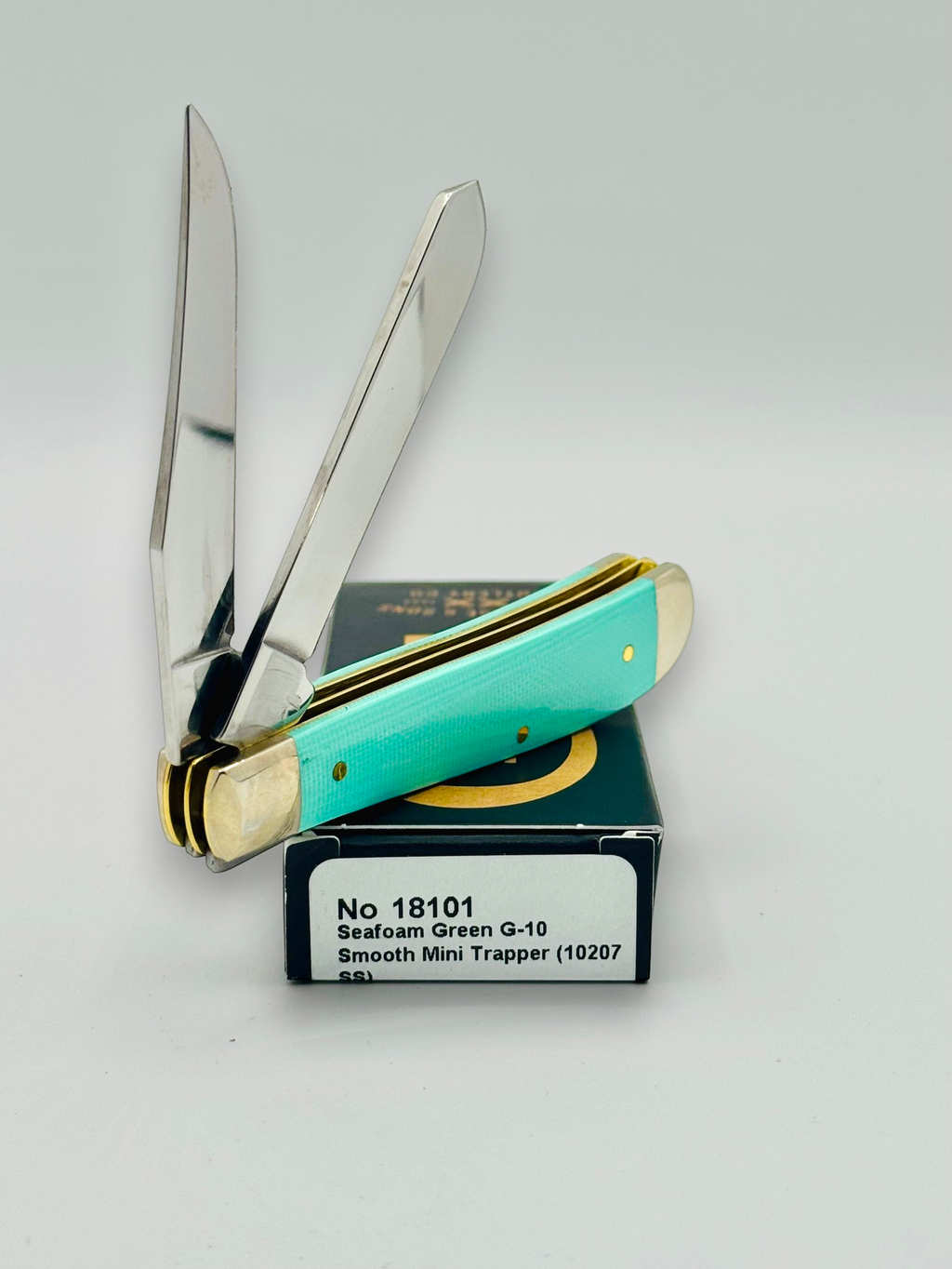 Case XX 18101 Seafoam Green G-10 Mini Trapper — spine and bolster view