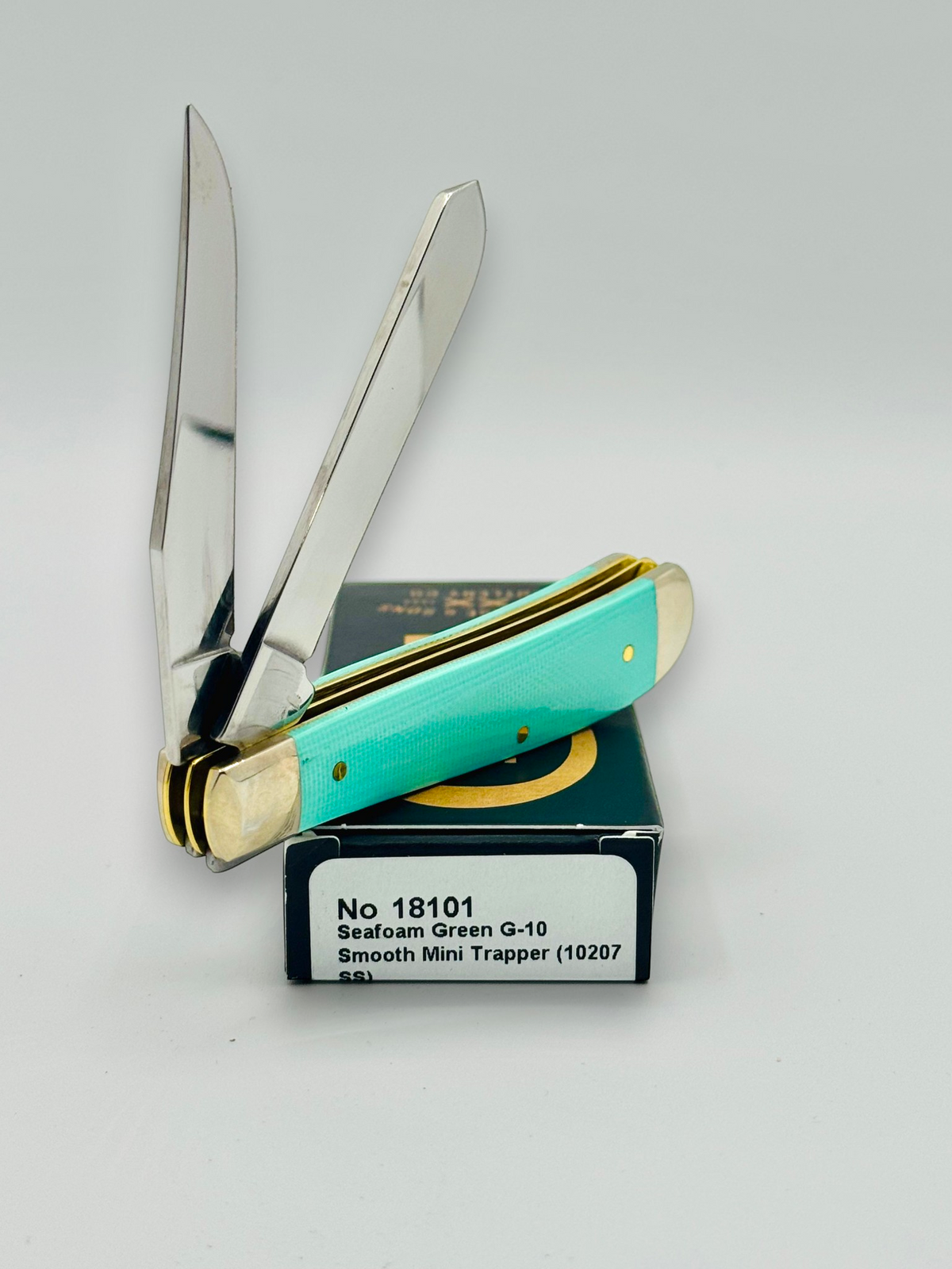 Case XX 18101 Seafoam Green G-10 Mini Trapper — spine and bolster view