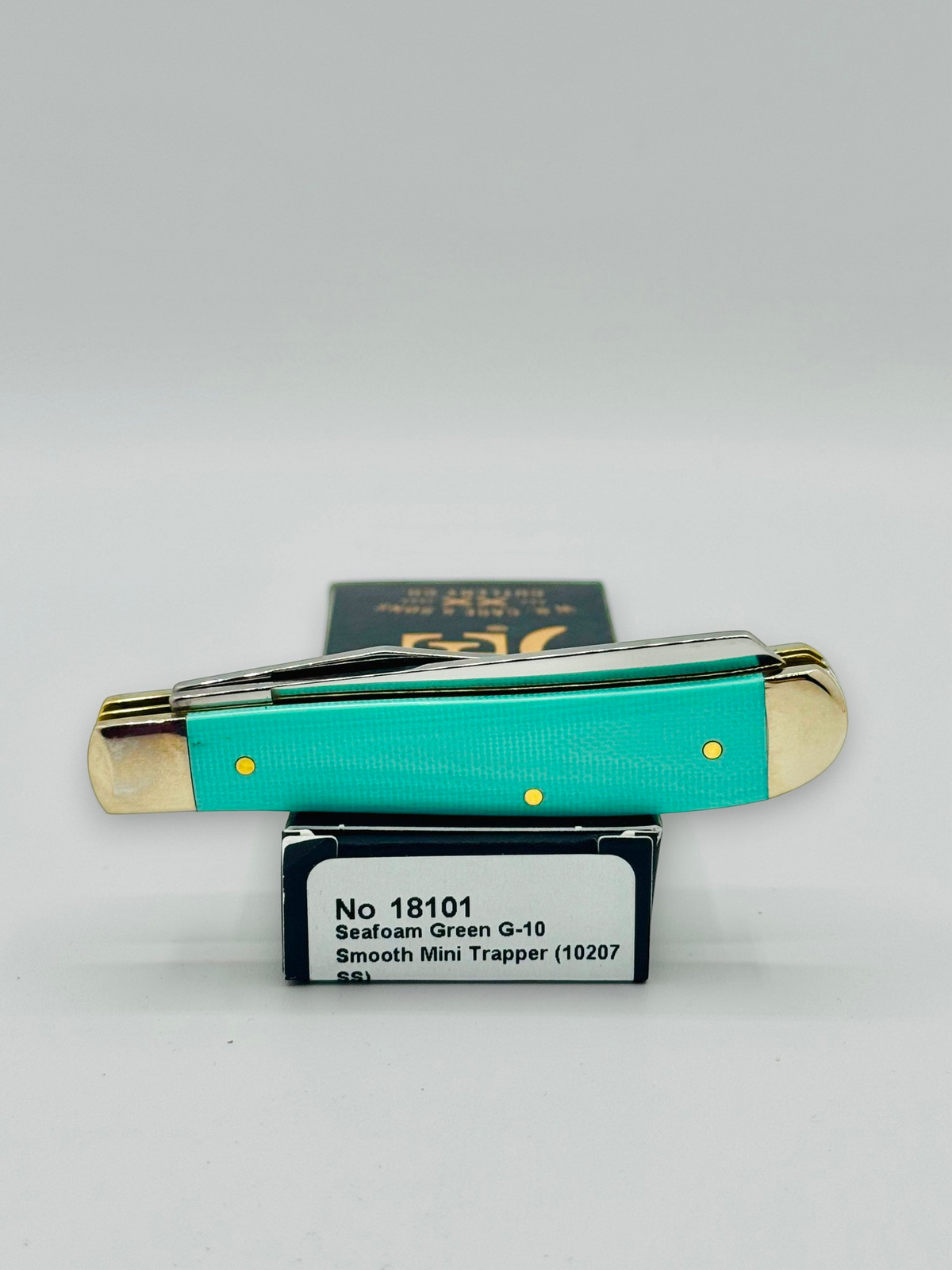 Case XX 18101 Seafoam Green G-10 Mini Trapper — boxed presentation