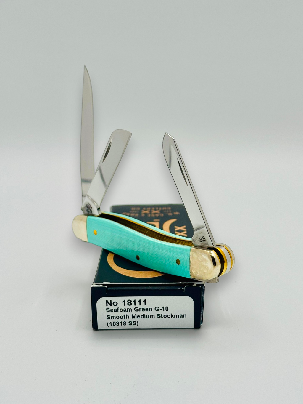 Case XX 18111 Seafoam Green G-10 Medium Stockman — handle and shield detail