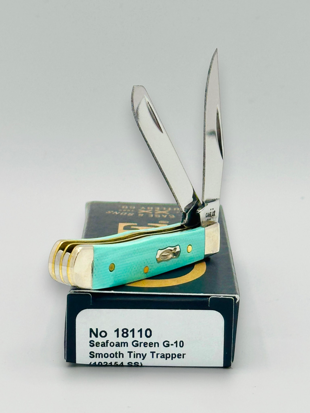 Case XX 18110 Seafoam Green G-10 Tiny Trapper — blade detail on Case box