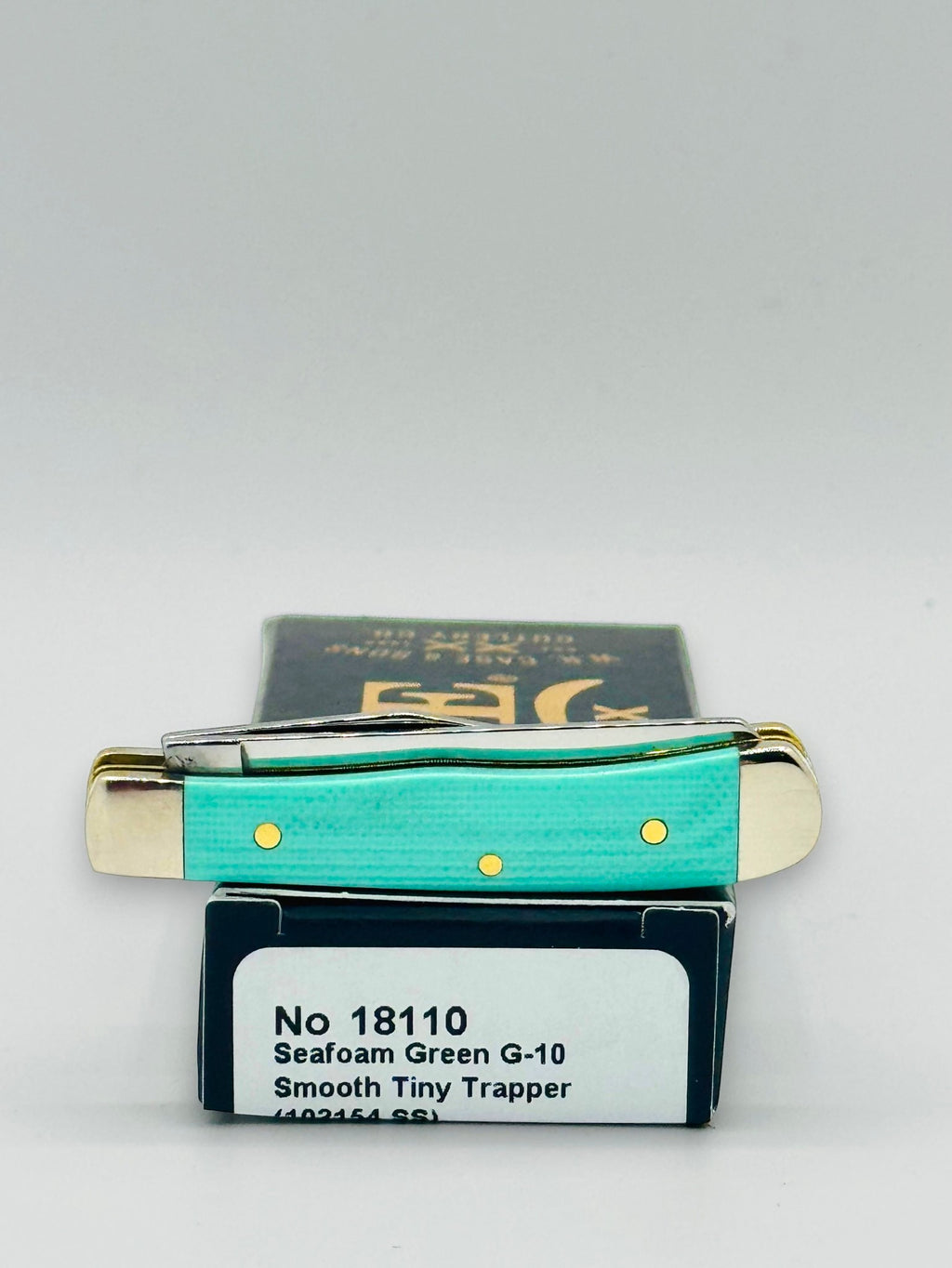 Case XX 18110 Seafoam Green G-10 Tiny Trapper — boxed presentation