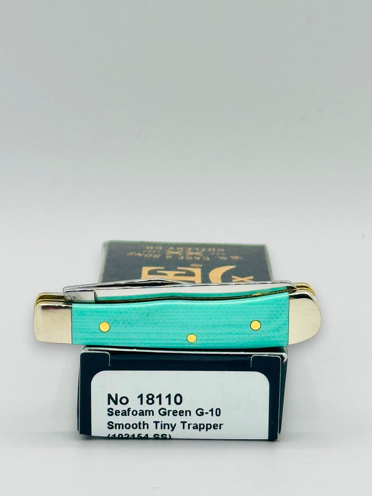 Case XX 18110 Seafoam Green G-10 Tiny Trapper — boxed presentation