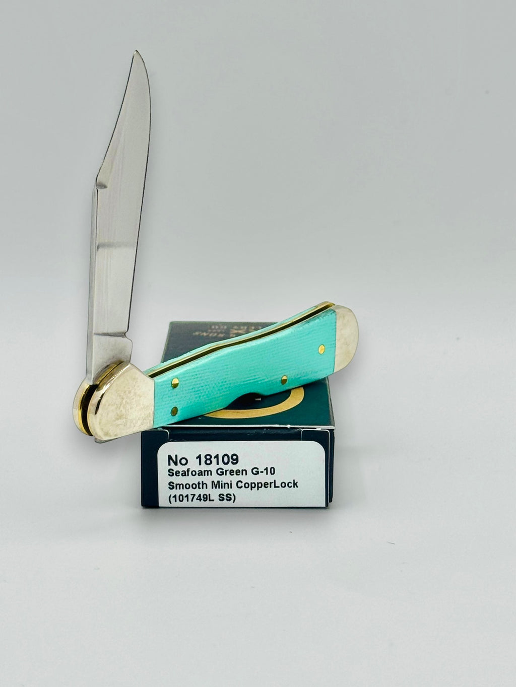 Case XX 18109 Seafoam Green G-10 Mini CopperLock — spine and bolster view