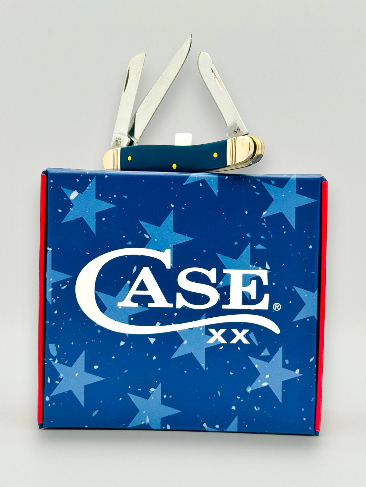 Case XX 10863 Navy Blue Synthetic Medium Stockman — handle and flag shield detail