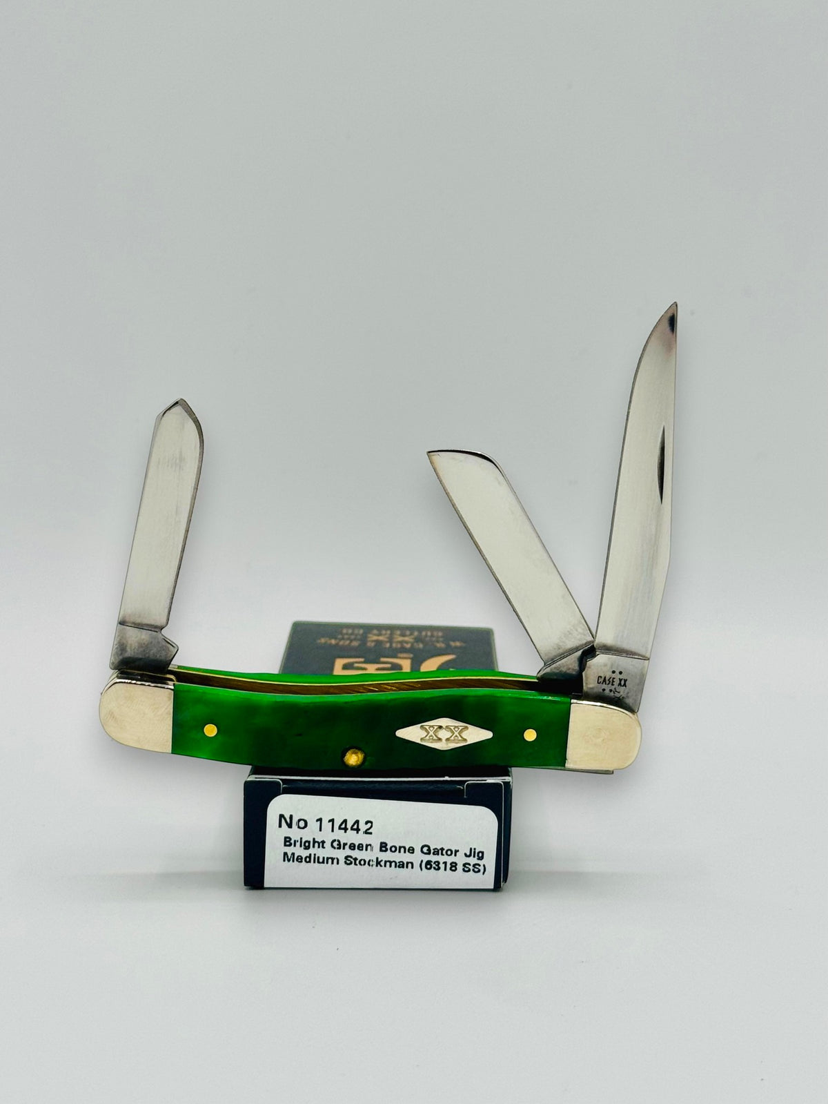 Case XX 11442 Bright Green Bone Gator Jig Medium Stockman — open on Case retail box