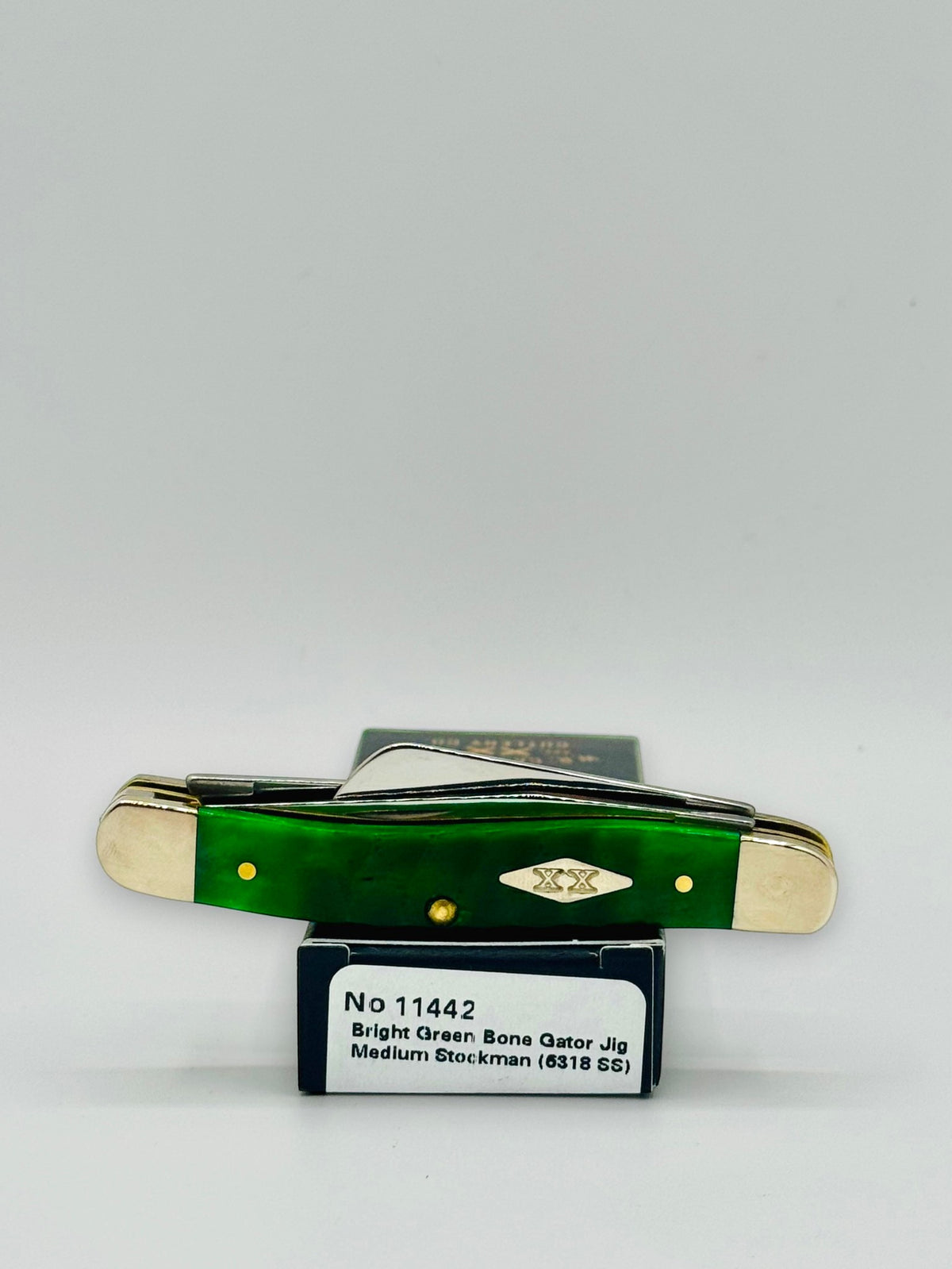 Case XX 11442 Bright Green Bone Gator Jig Medium Stockman — profile on Case packaging