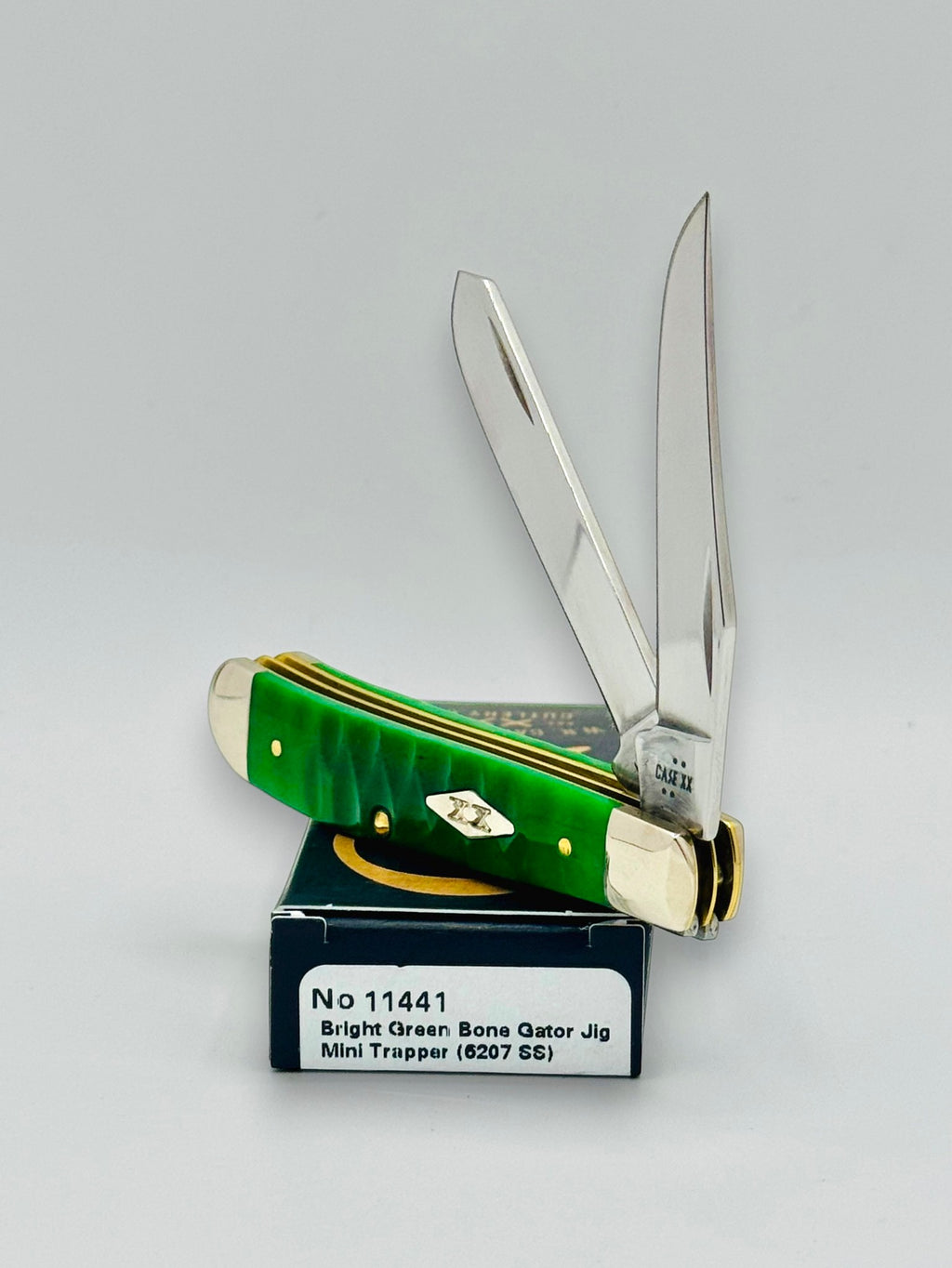 Case XX 11441 Bright Green Bone Gator Jig Mini Trapper — closed on Case box