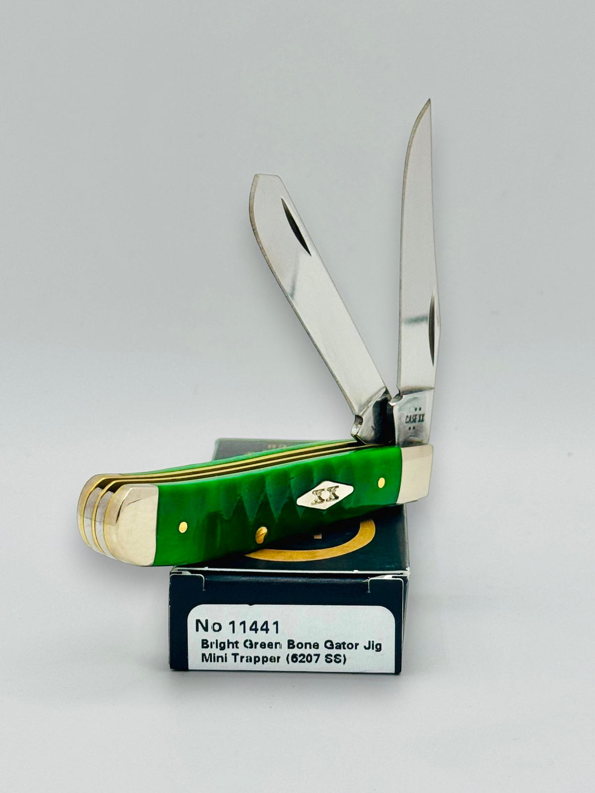 Case XX 11441 Bright Green Bone Gator Jig Mini Trapper — blade detail on Case box