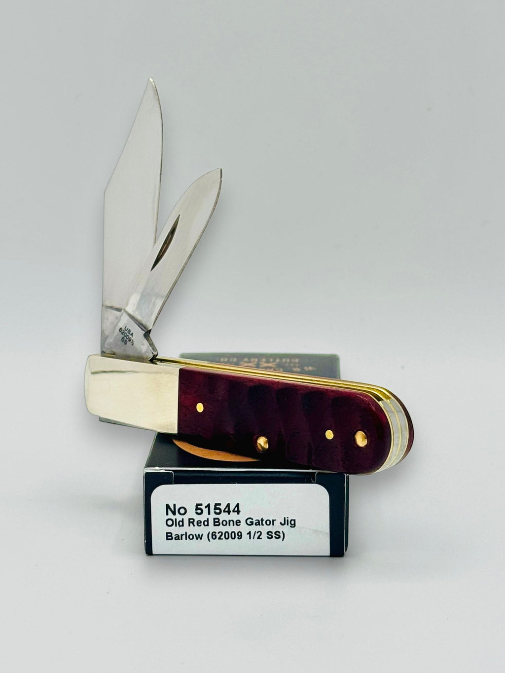 Case XX 51544 Red Bone Gator Jig Barlow — handle and shield detail
