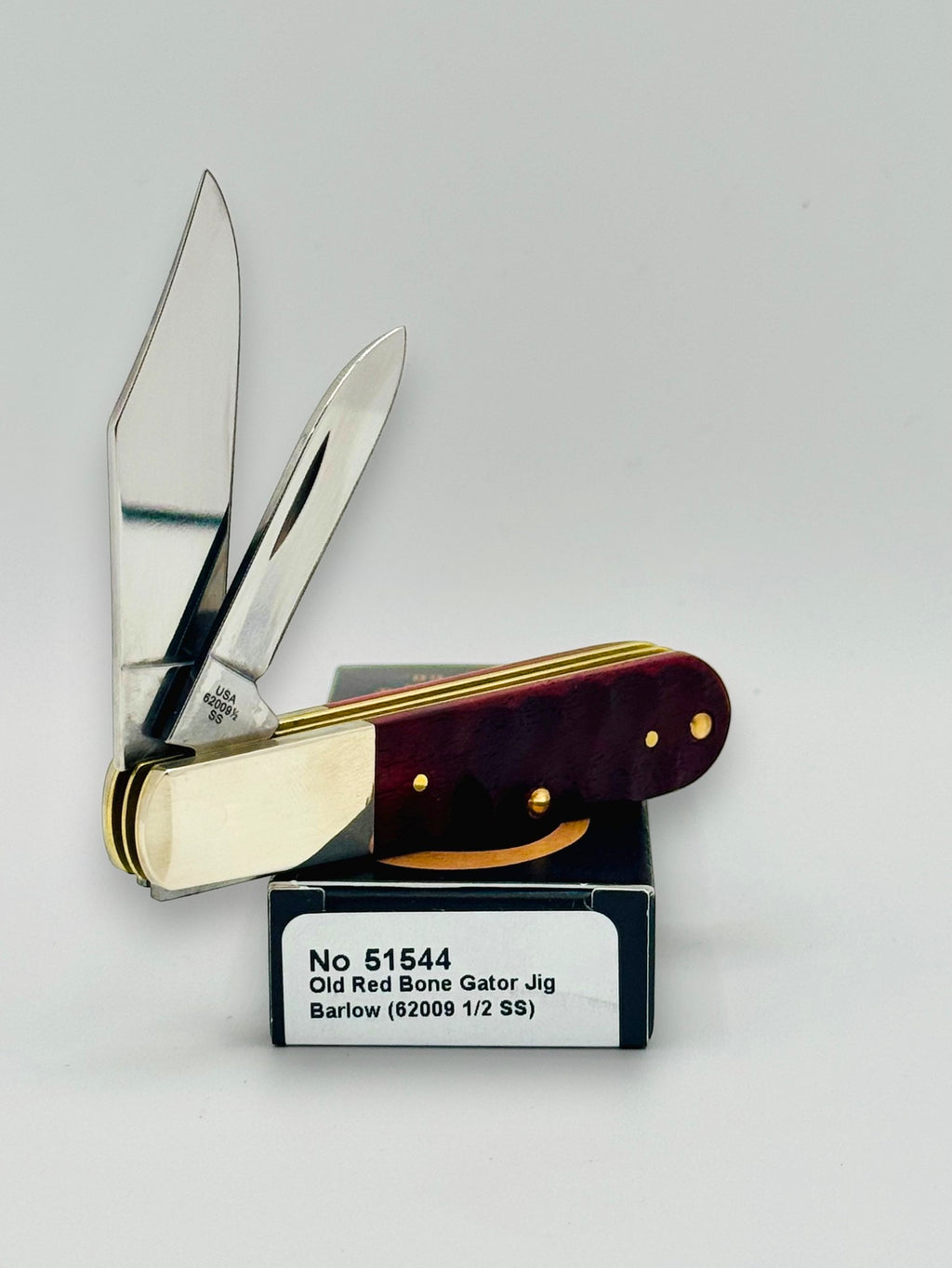 Case XX 51544 Red Bone Gator Jig Barlow — spine and bolster view