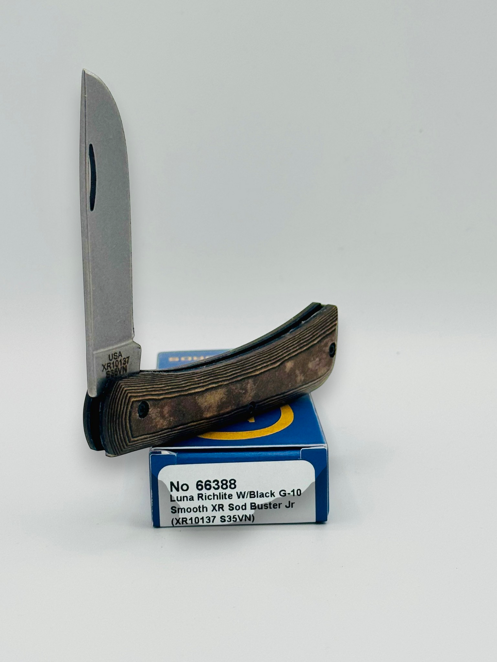 Case XX 66388 Crossroads Black Tan Richlite Sod Buster Jr — spine and bolster view