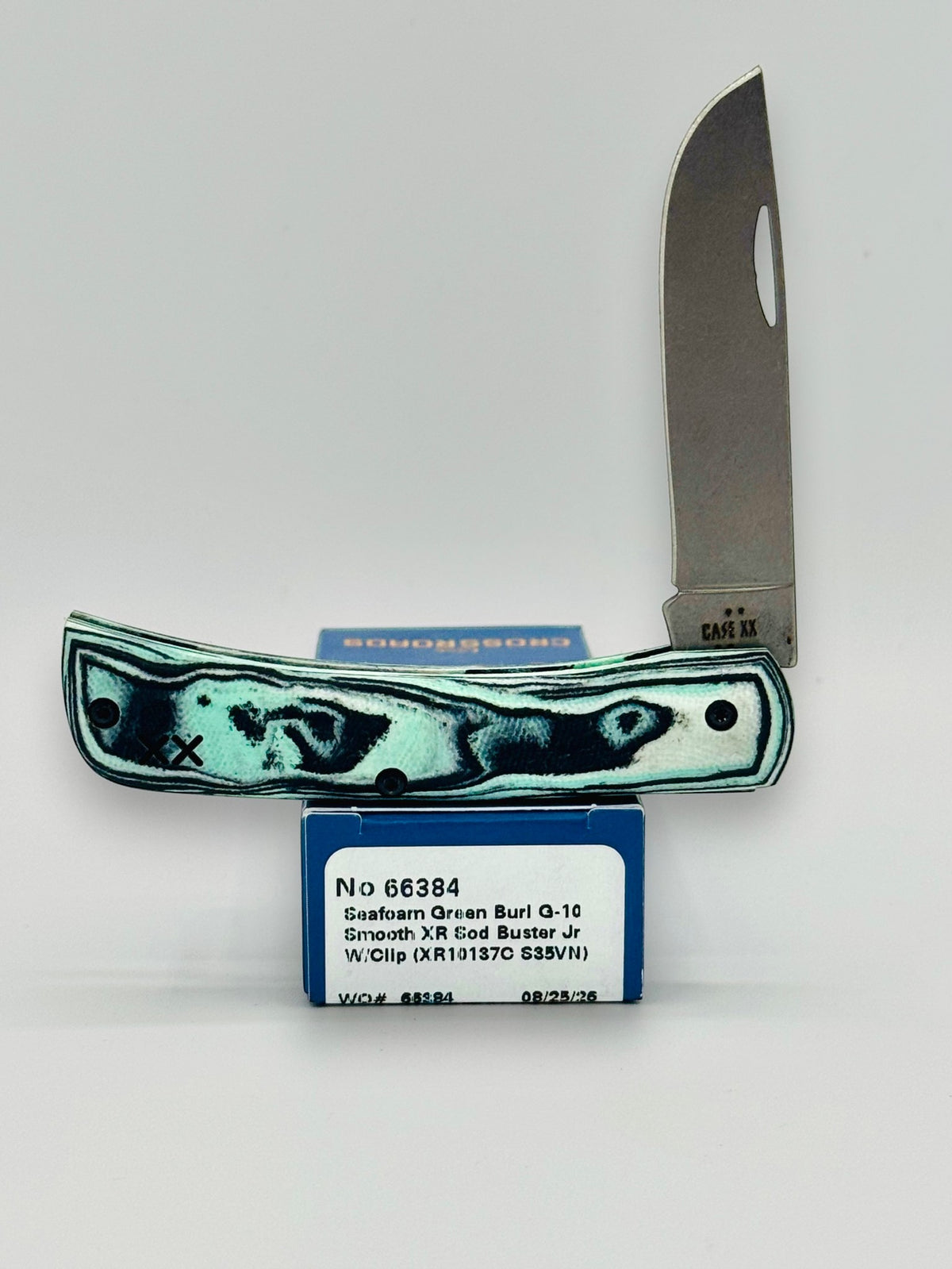 Case XX 66384 Crossroads Seafoam G-10 Sod Buster Jr — open on Case retail box