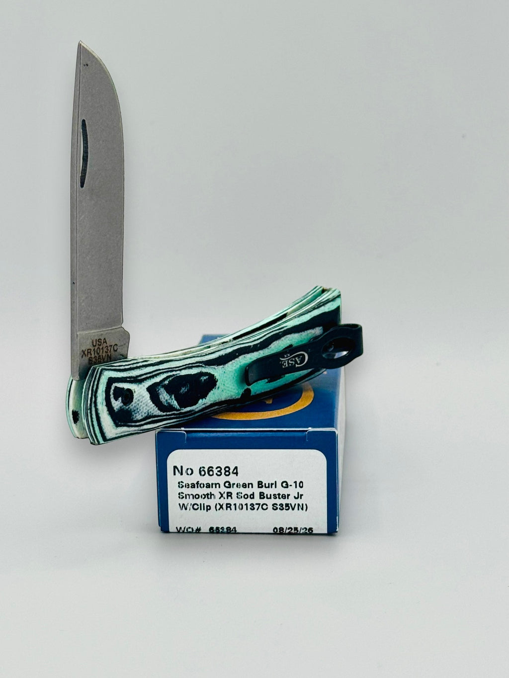 Case XX 66384 Crossroads Seafoam G-10 Sod Buster Jr — spine and bolster view
