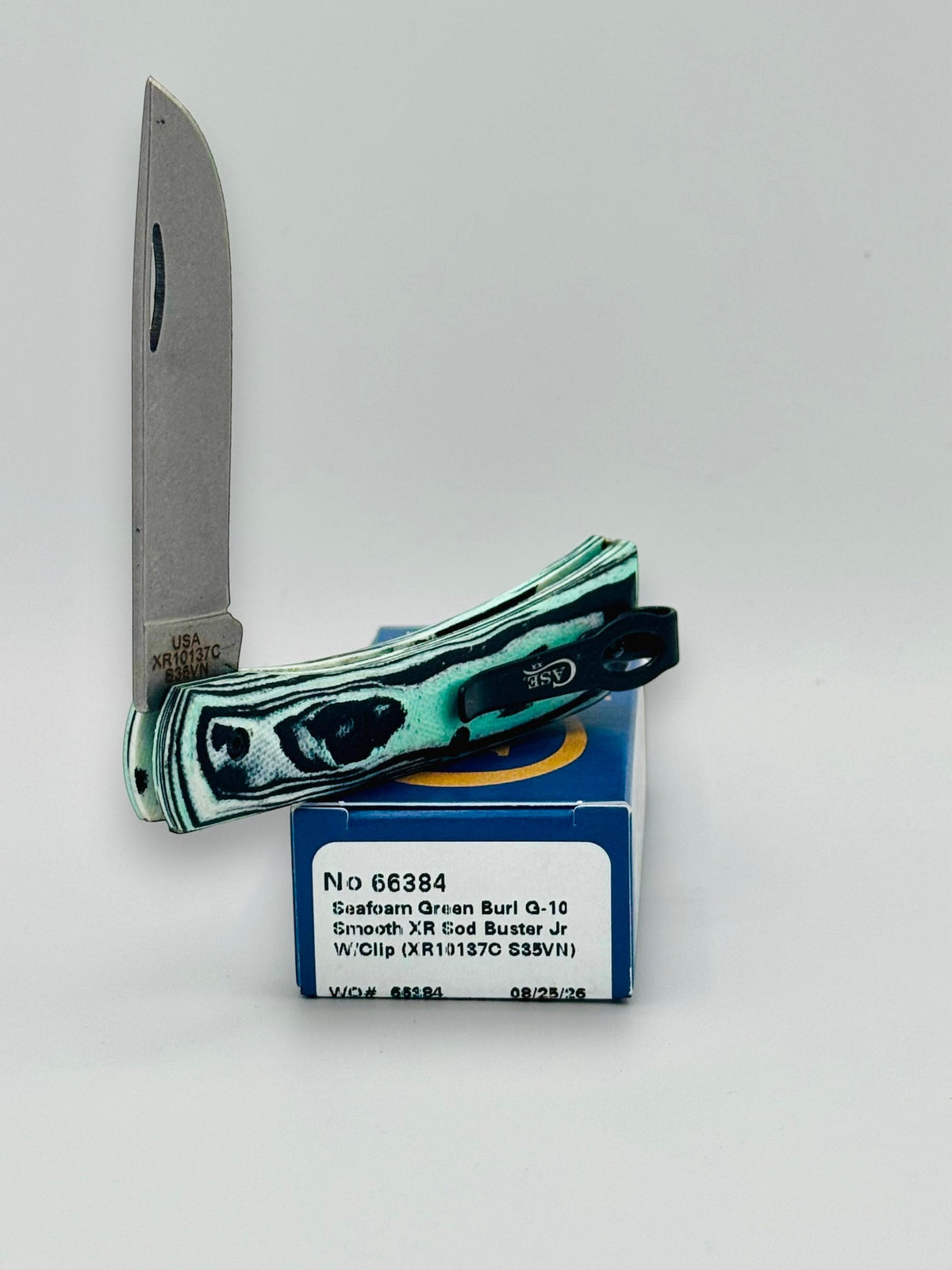 Case XX 66384 Crossroads Seafoam G-10 Sod Buster Jr — spine and bolster view
