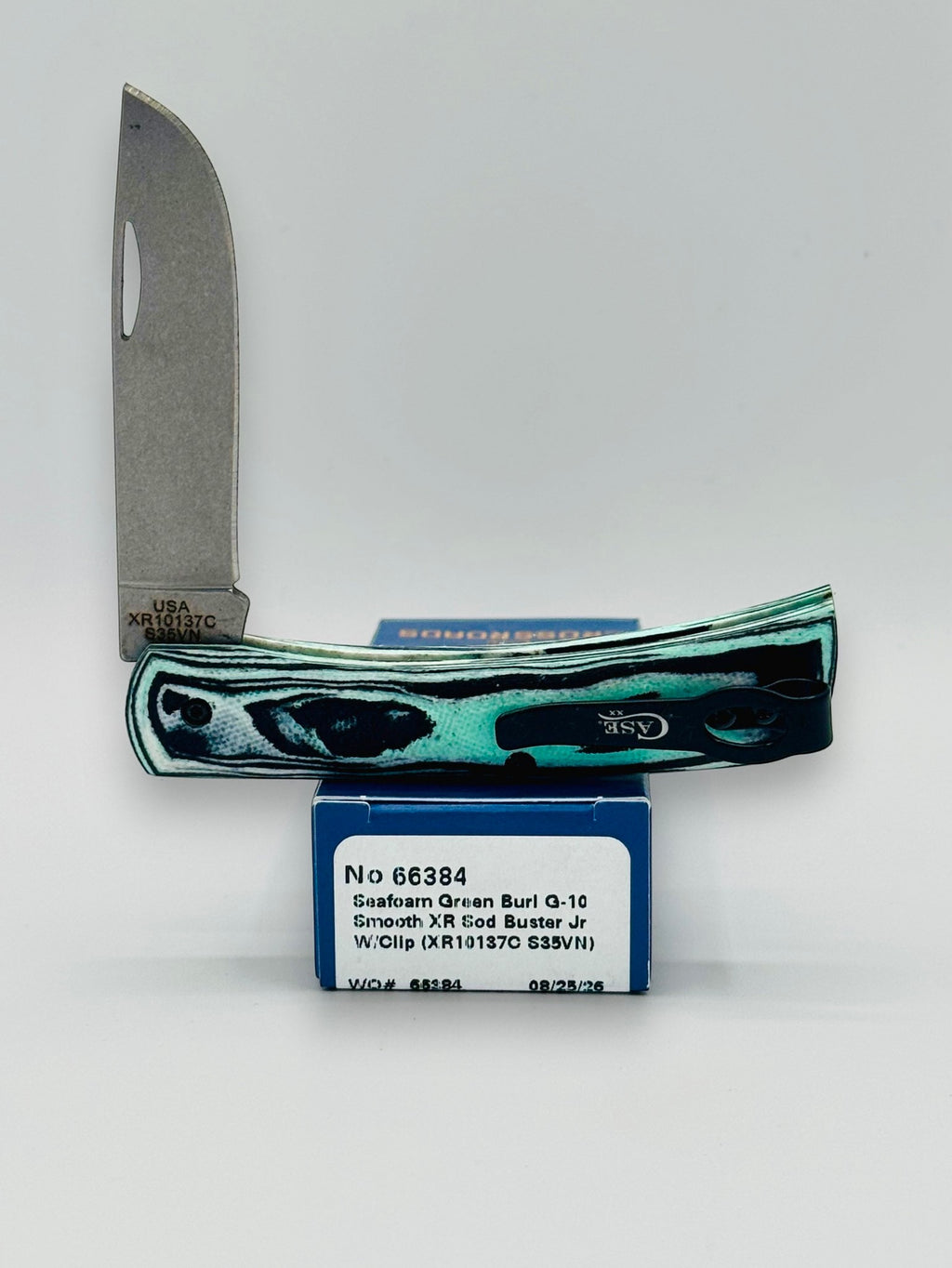 Case XX 66384 Crossroads Seafoam G-10 Sod Buster Jr — angled open on Case box