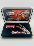 Case XX UofL 2013 Champs Corelon Trapper — open on Case retail box