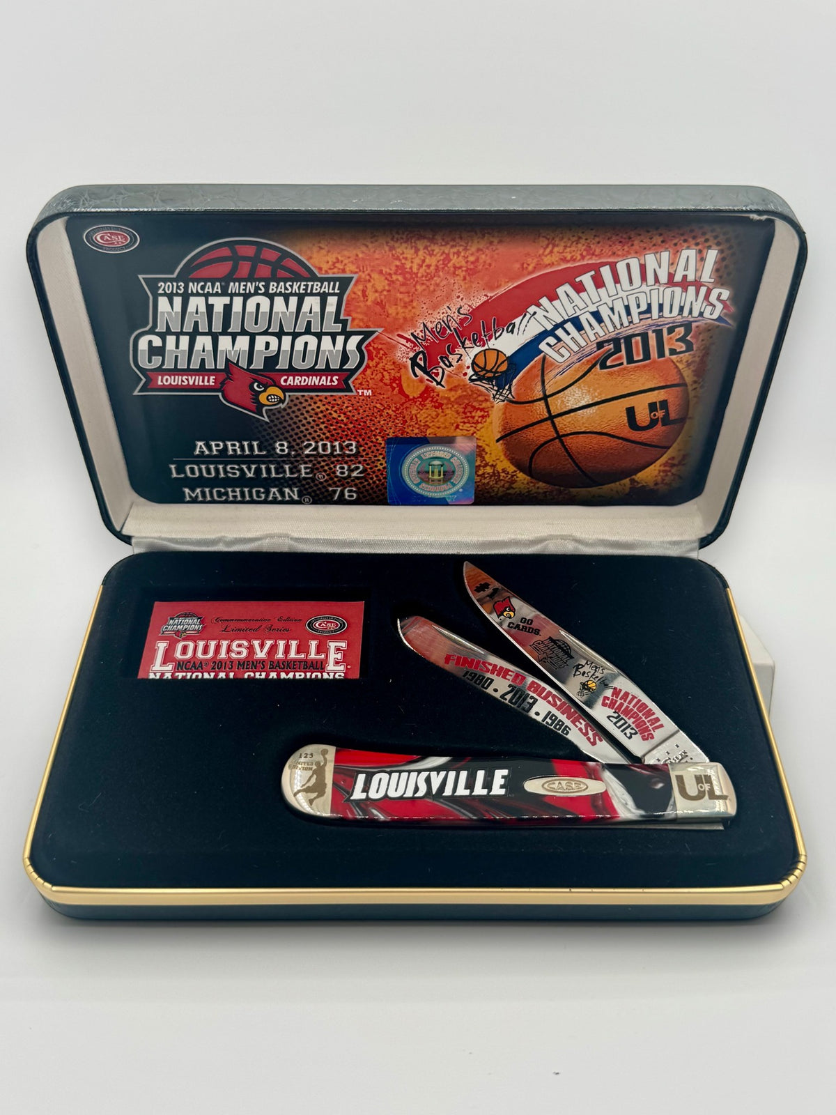 Case XX UofL 2013 Champs Corelon Trapper — open on Case retail box