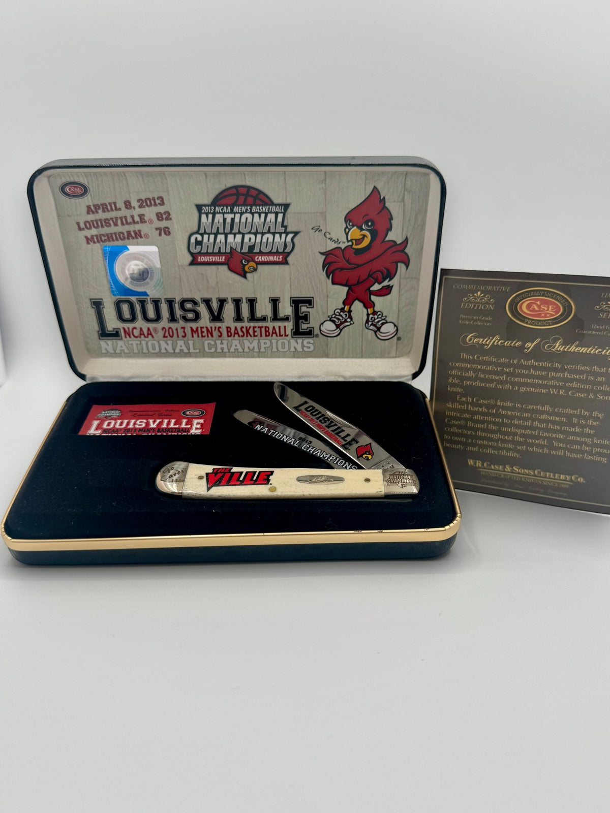 Case XX UofL 2013 Champs Bone Trapper — open on Case retail box
