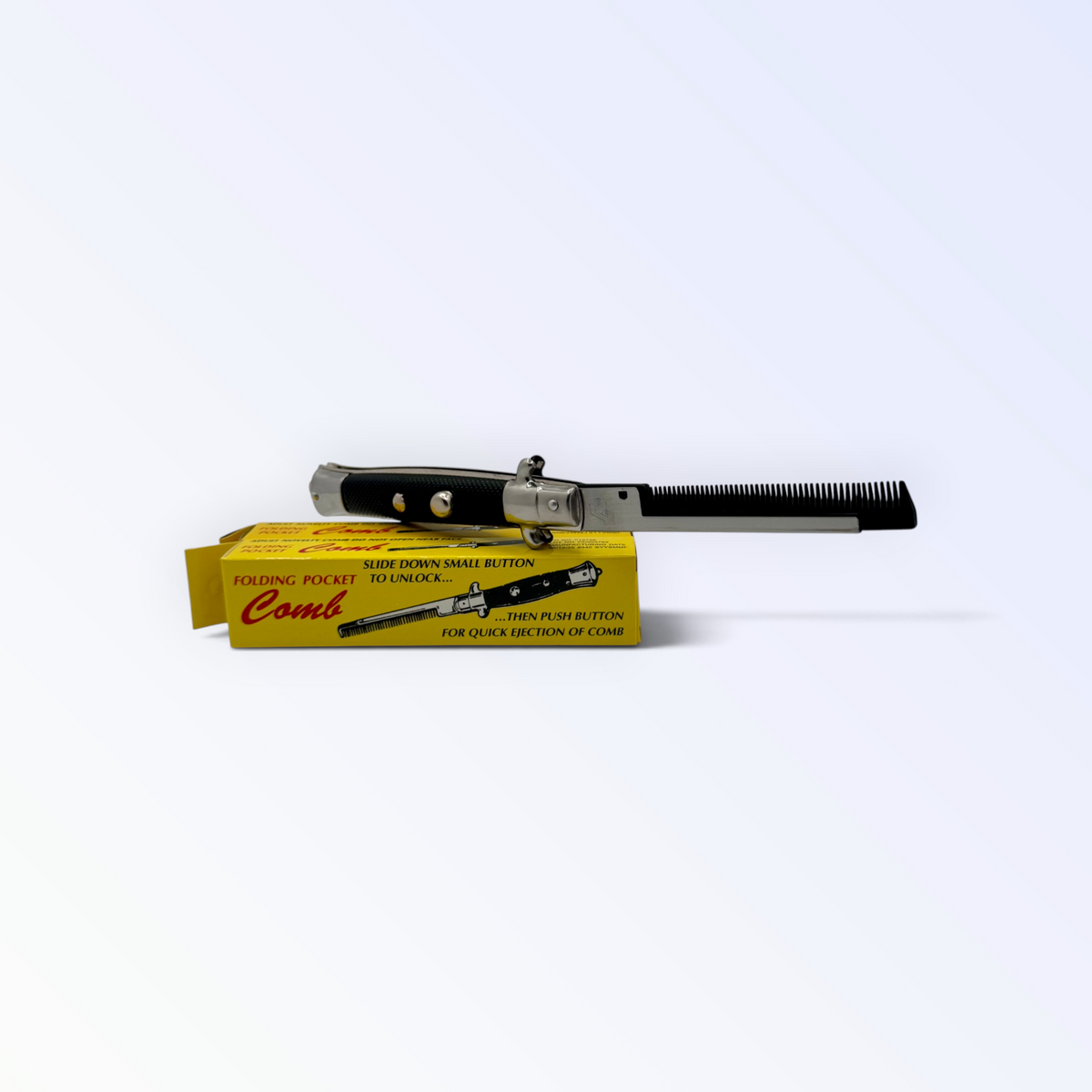 Switchblade Comb (Novelty)